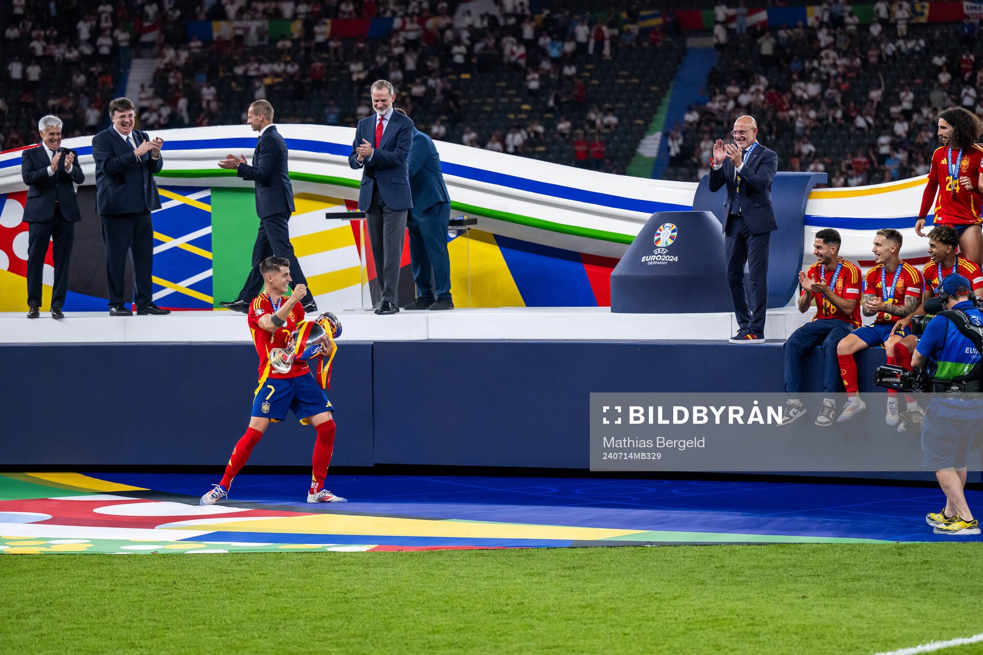 Alvaro Morata of Spain celebrates with the trophy