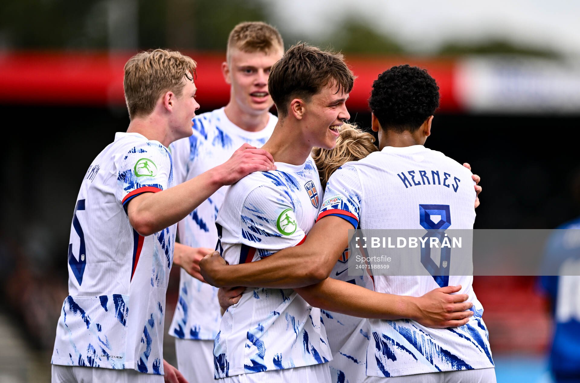 Daniel Braut of Norway celebrates with teammates