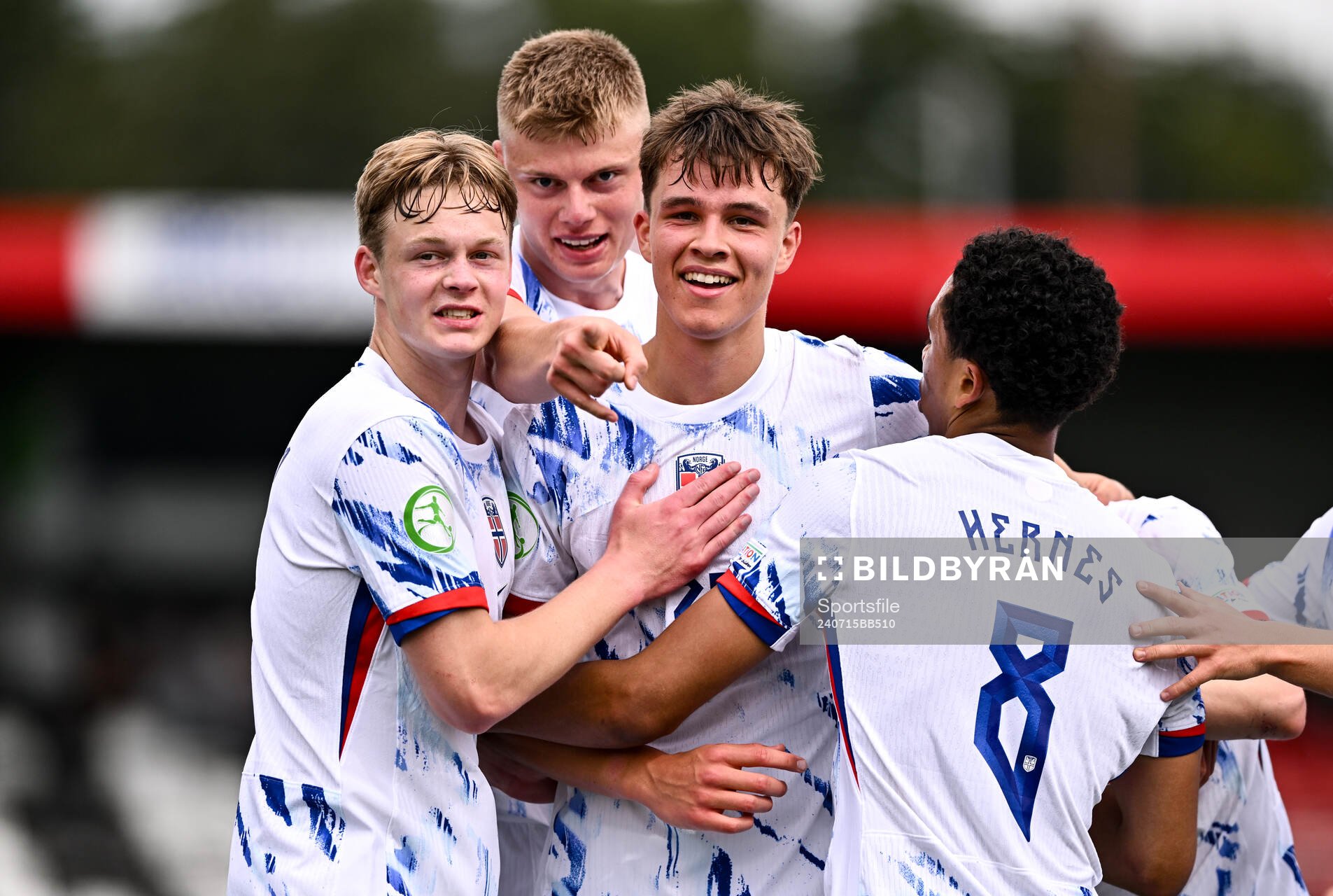 Daniel Braut of Norway celebrates with teammates