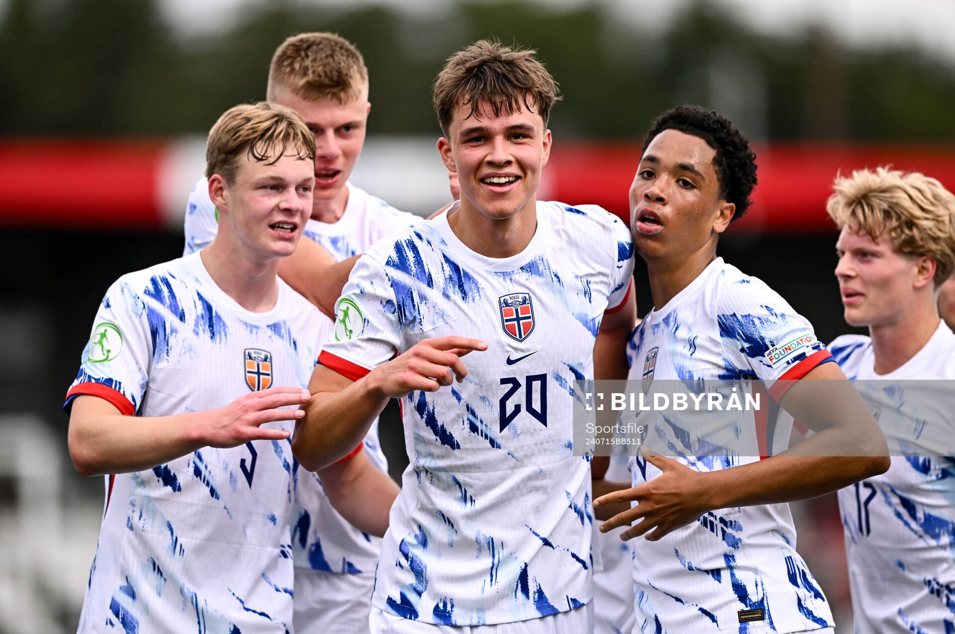 Daniel Braut of Norway celebrates with teammates