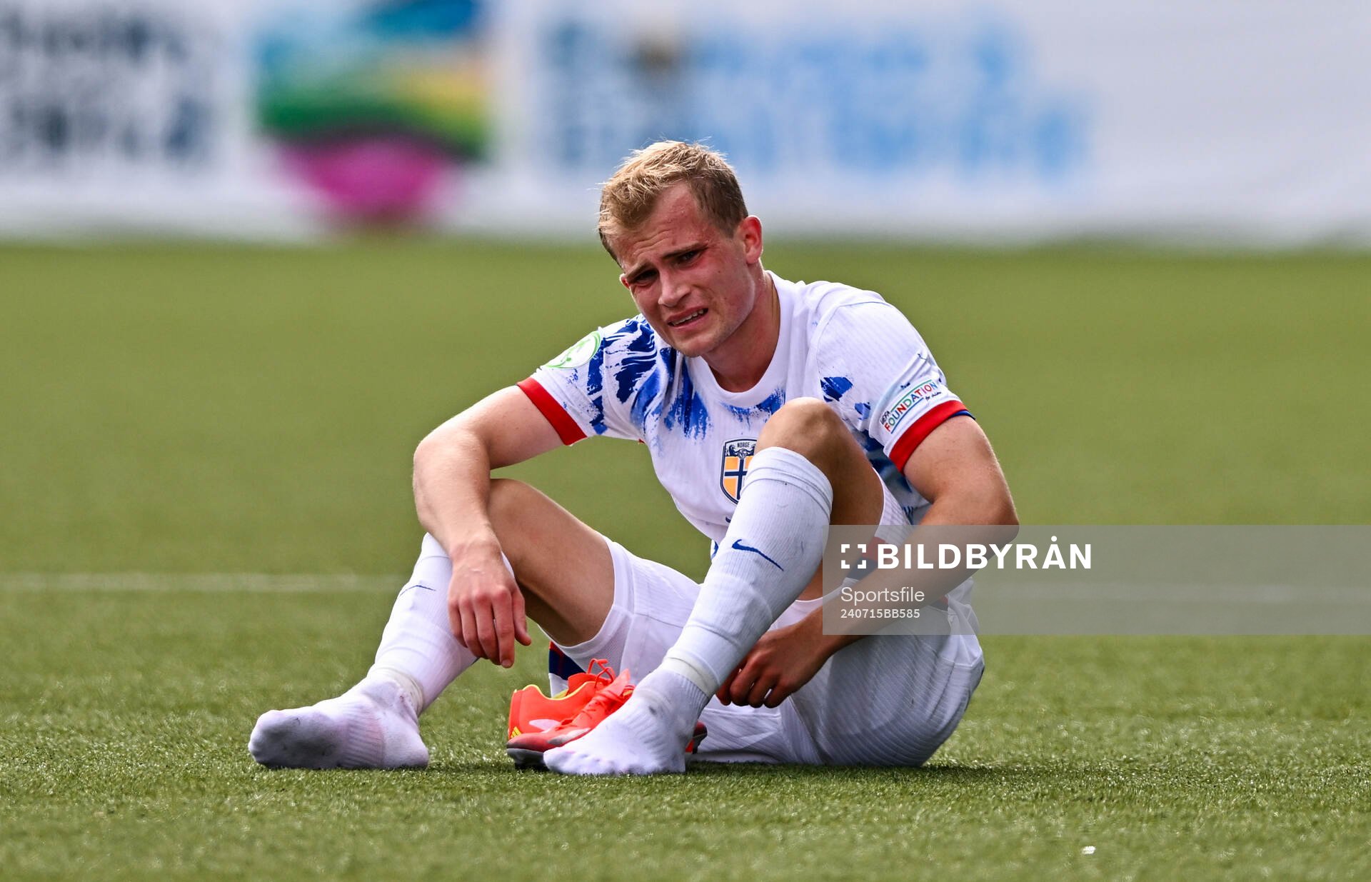 Aleksander Andresen of Norway dejected at the final whistle