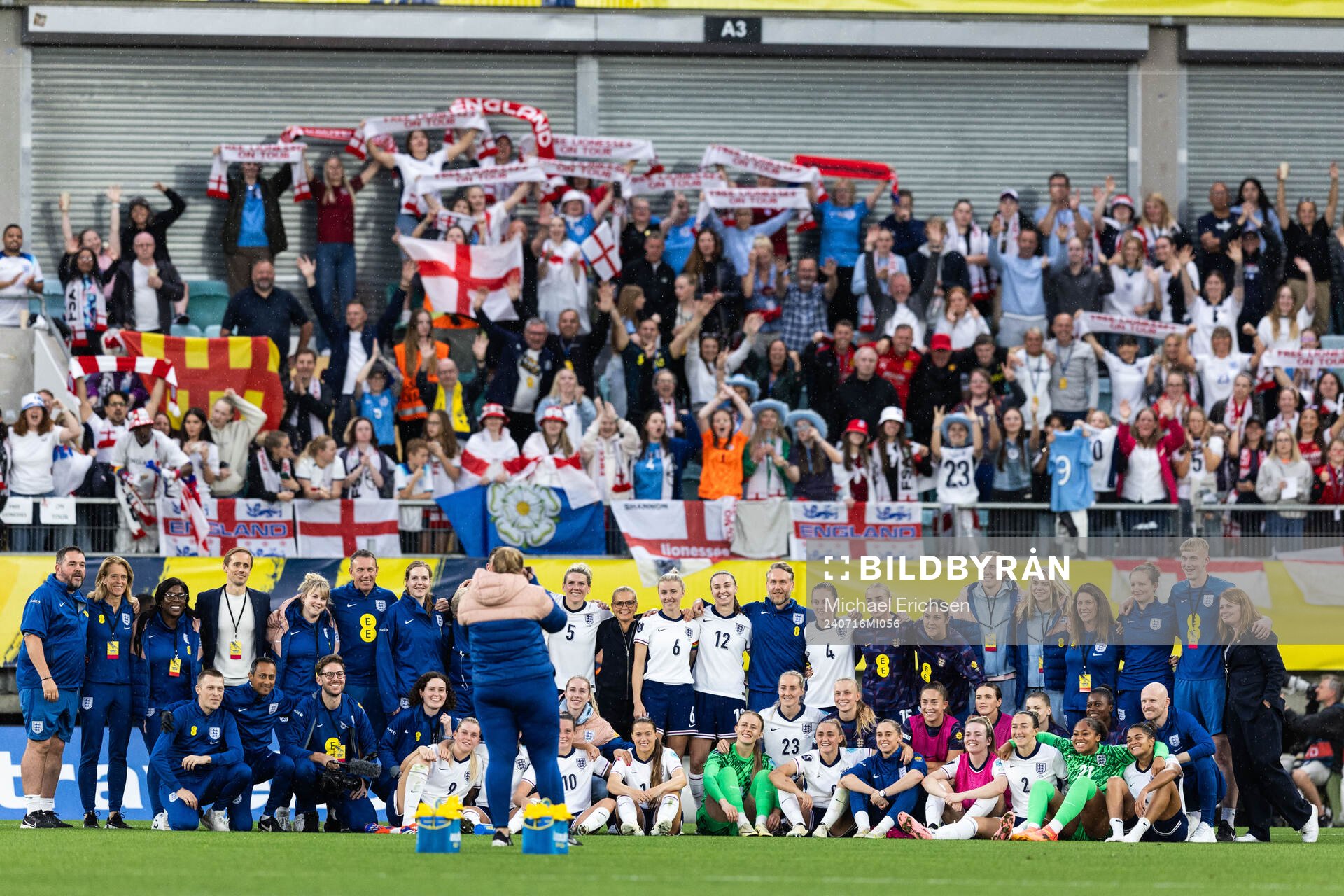 Players of England celebrate with fans