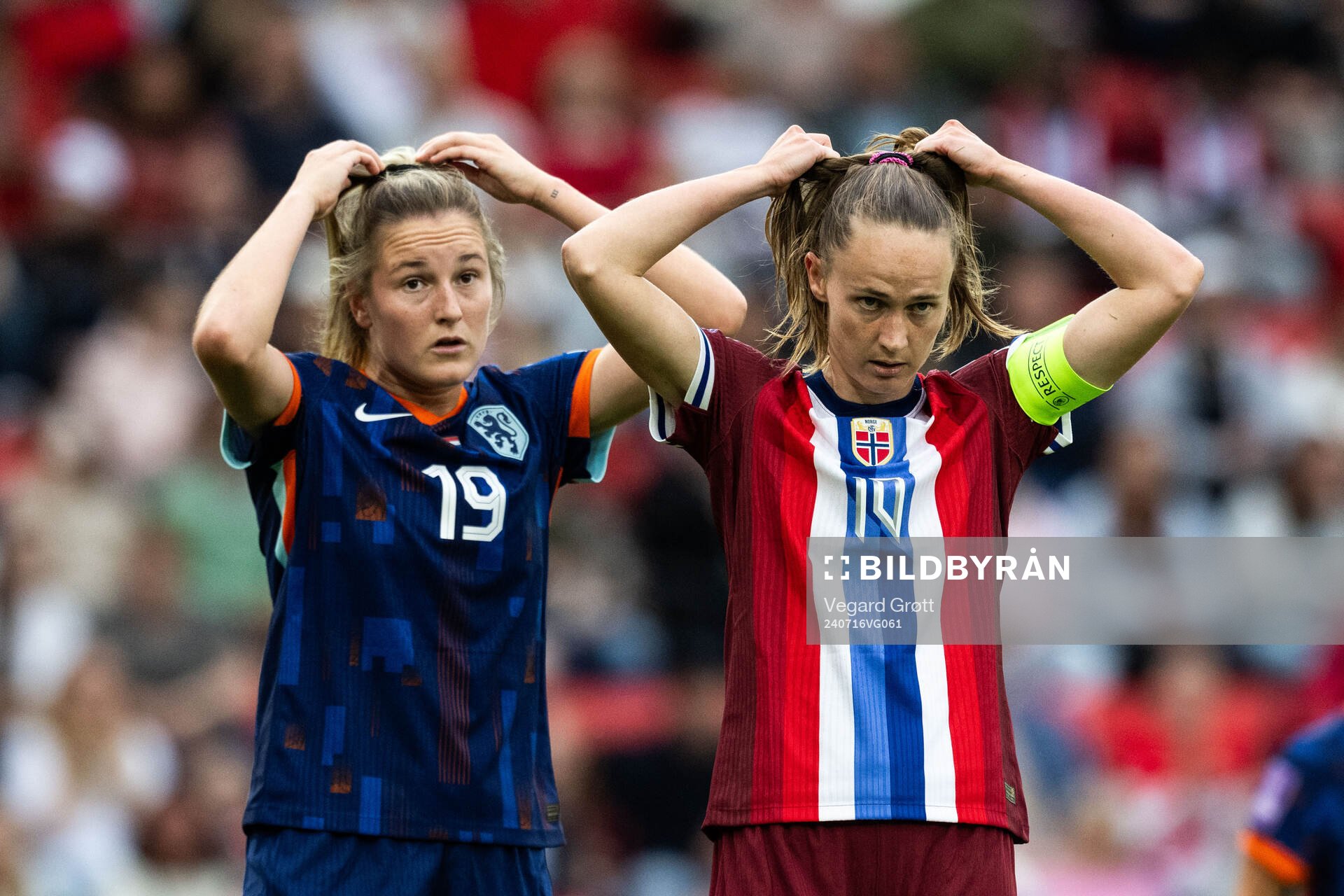 Wieke Kaptein of Netherlands and Caroline Graham Hansen of