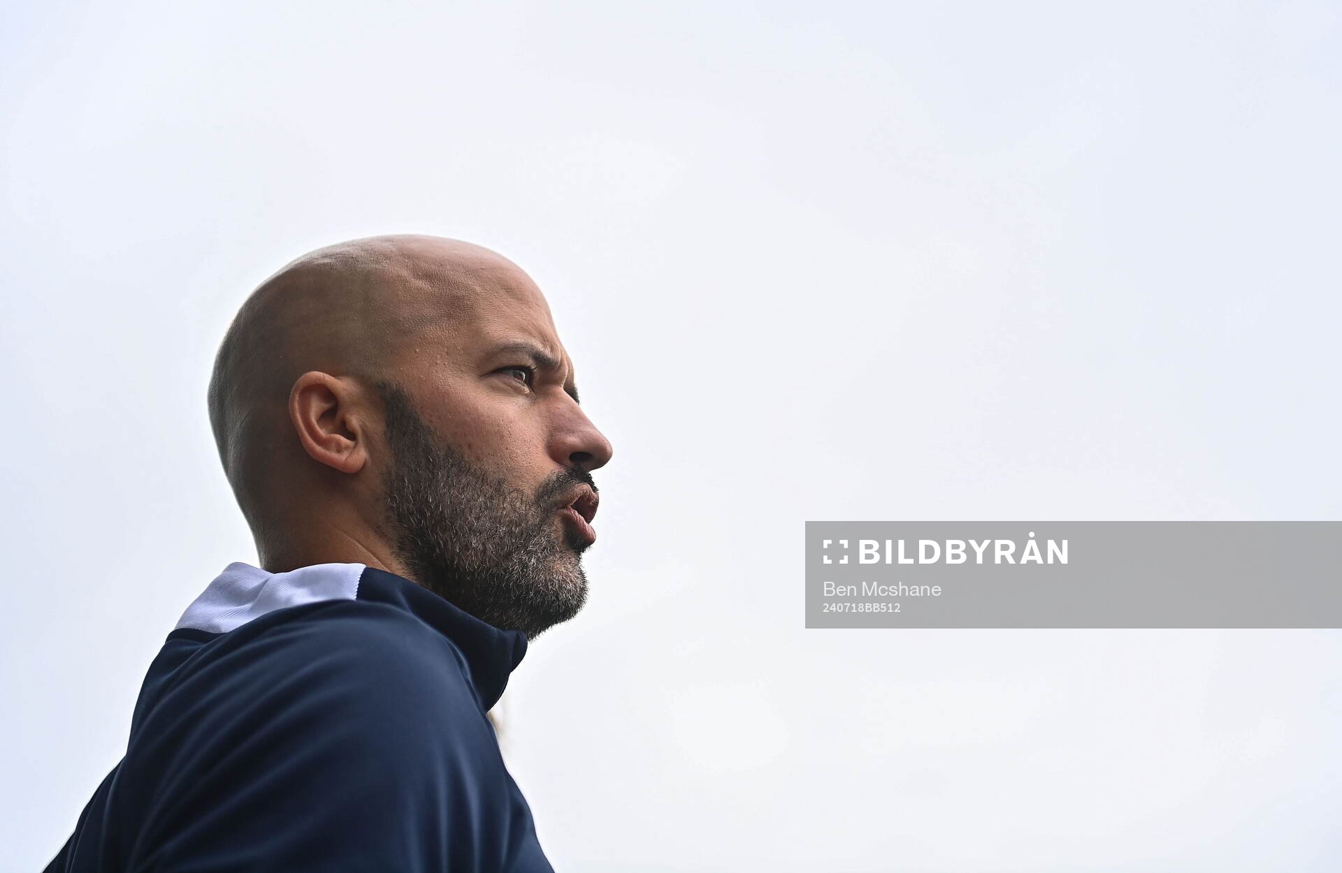 Norway head coach Luis Pimenta sings the national anthem
