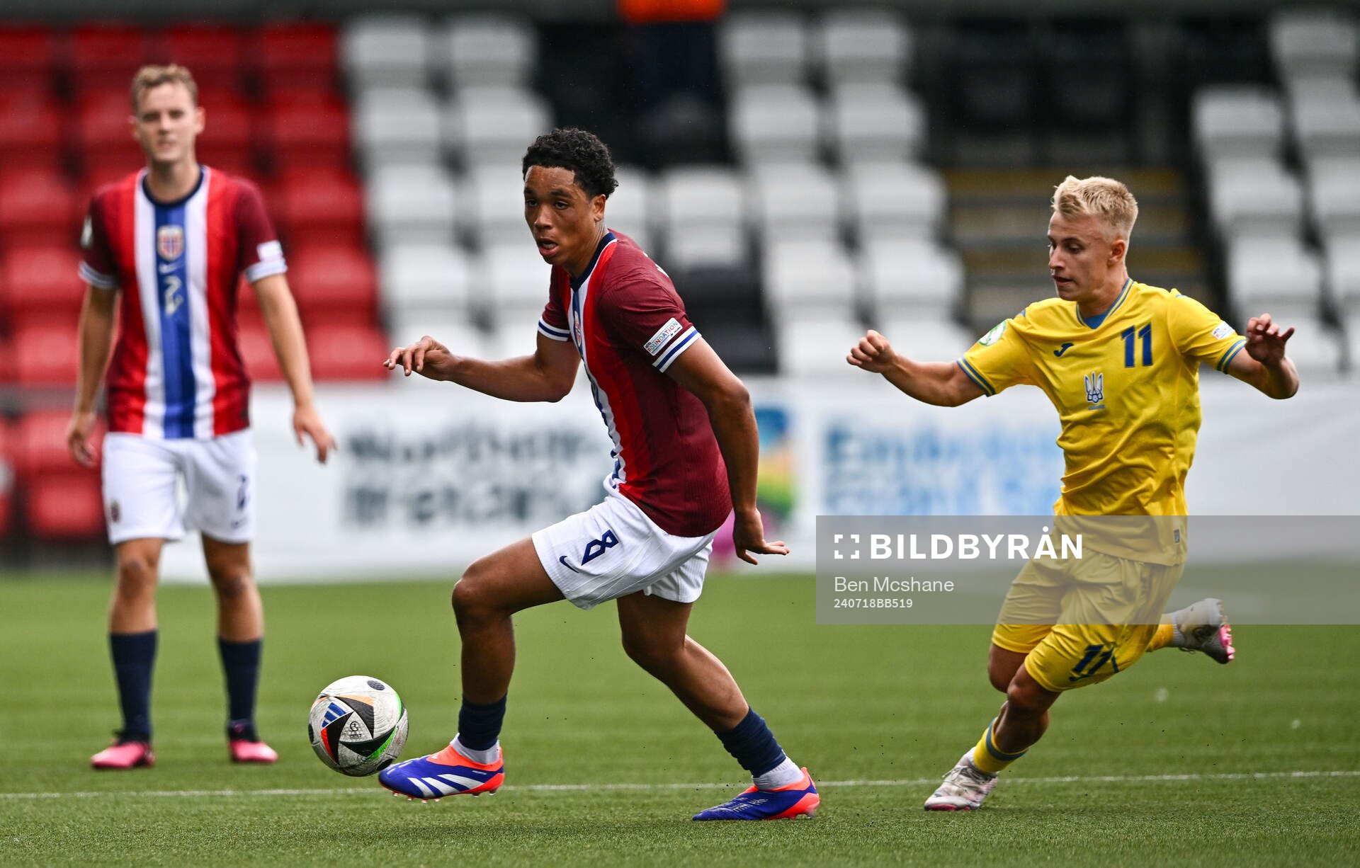 Travis Hernes of Norway in action against Danylo Krevsun of