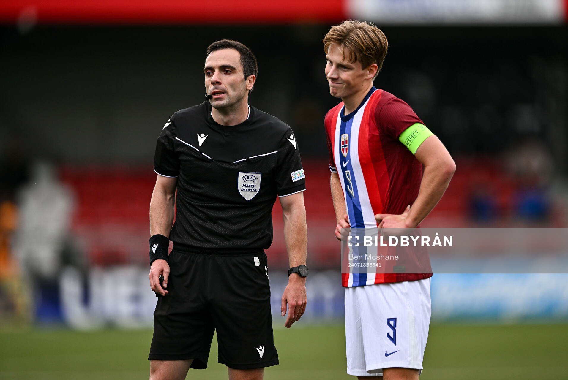 Benjamin Thoresen Faraas of Norway with referee Henrik