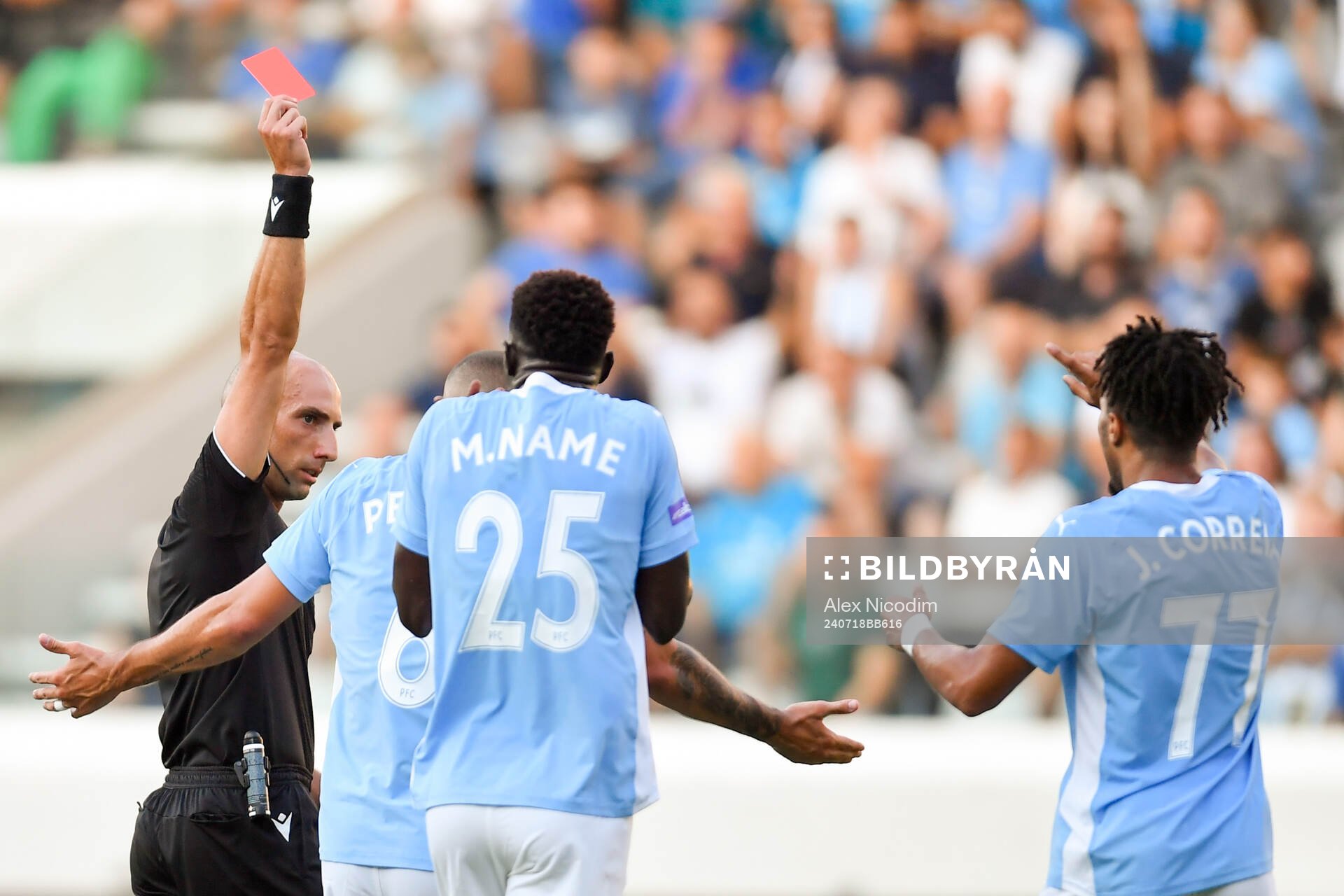 Joao Correia of Pafos receives a red card