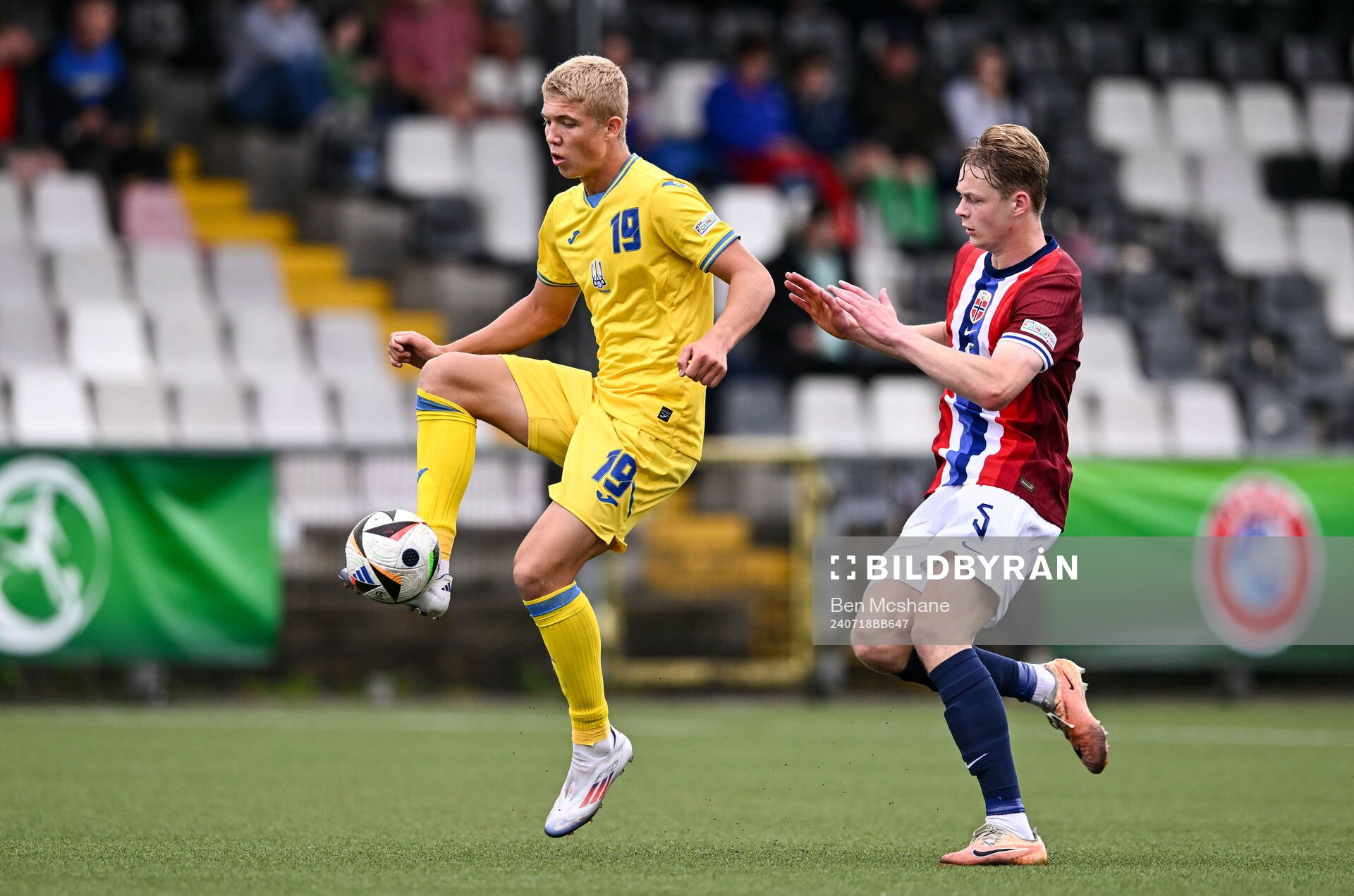 Dmytro Bohdanov of Ukraine in action against Rasmus Holten