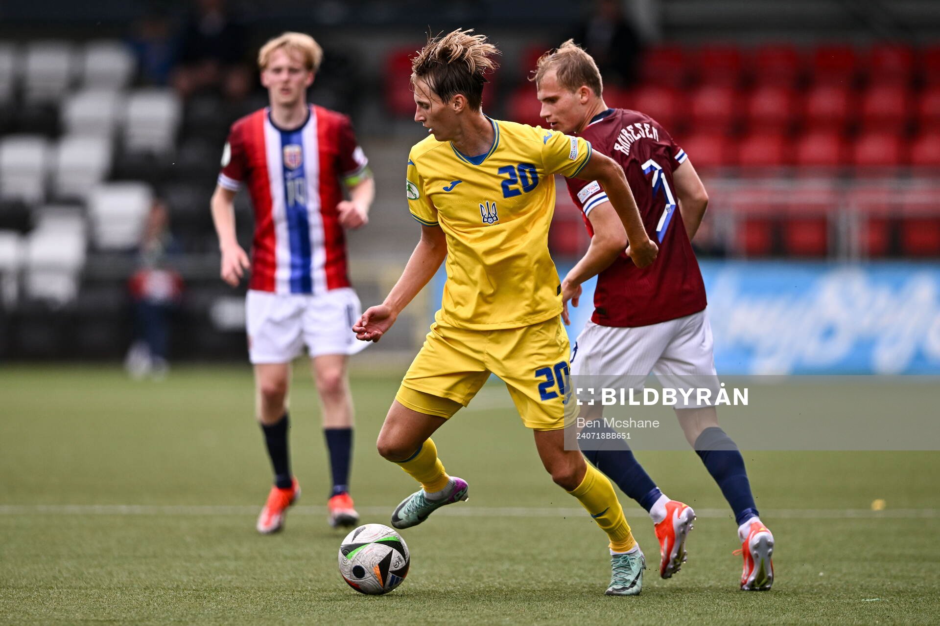 Oleksiy Gusiev of Ukraine in action against Aleksander Andresen of Norway during the UEFA European Under-19 Championship group stage football match between Norway and Ukraine on July 18, 2024 in Belfast.