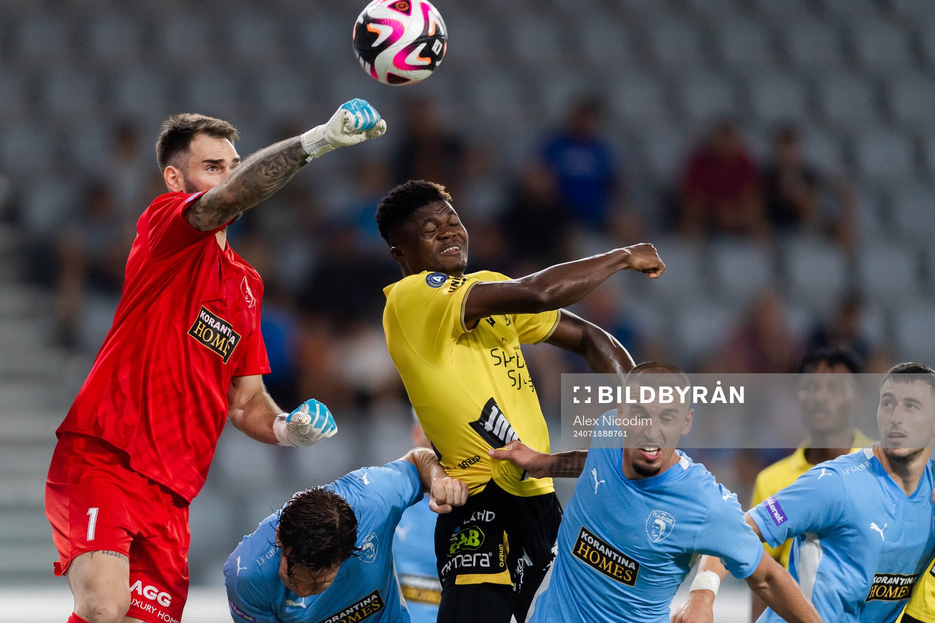 Goalkeeper Ivica Ivusic of Pafos and Jalal Abdullai  of