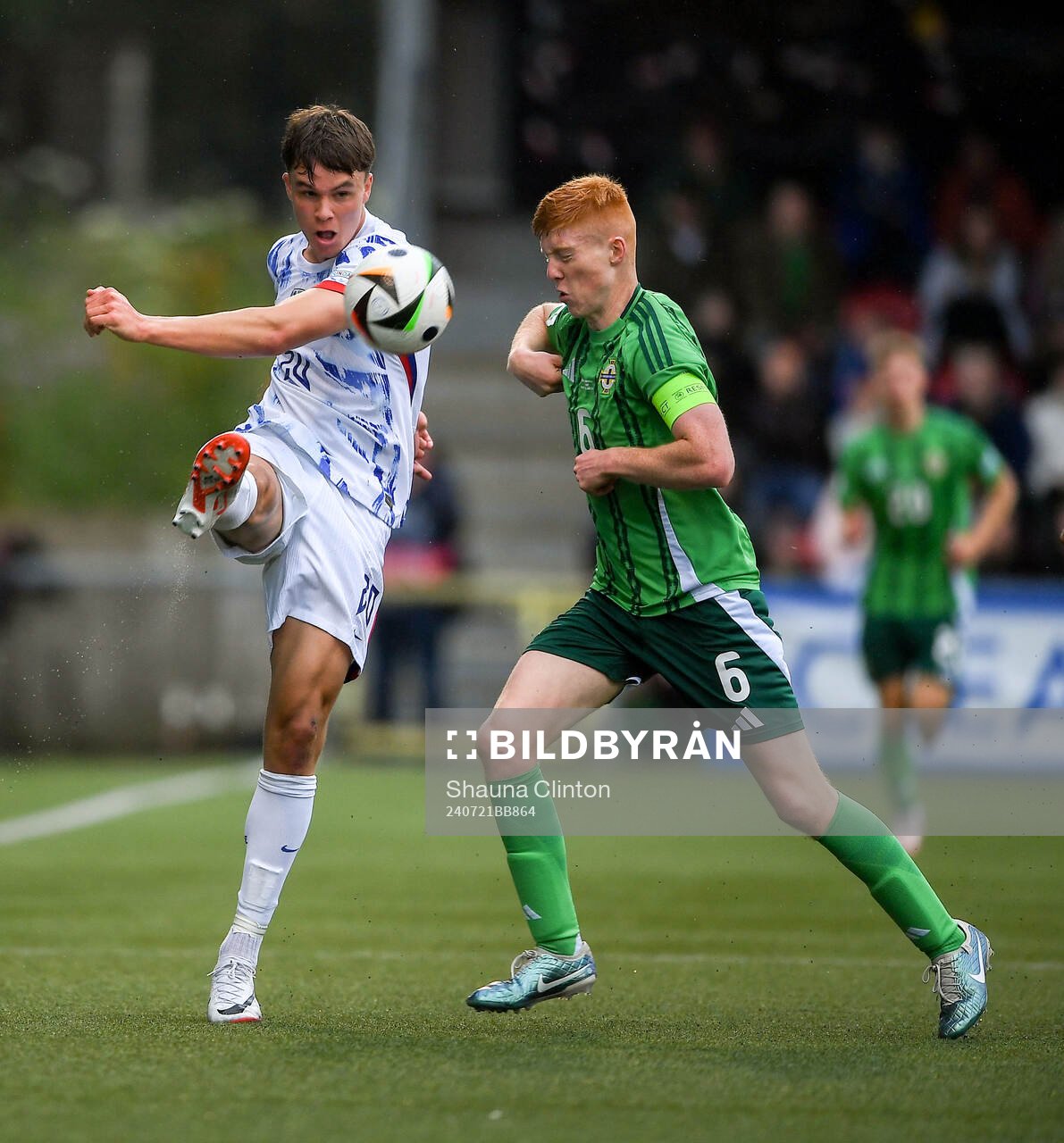 Daniel Braut of Norway is tackled by Gallagher Lennon of