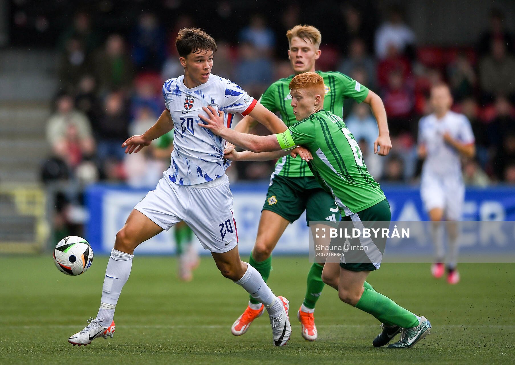 Daniel Braut of Norway is tackled by Gallagher Lennon of