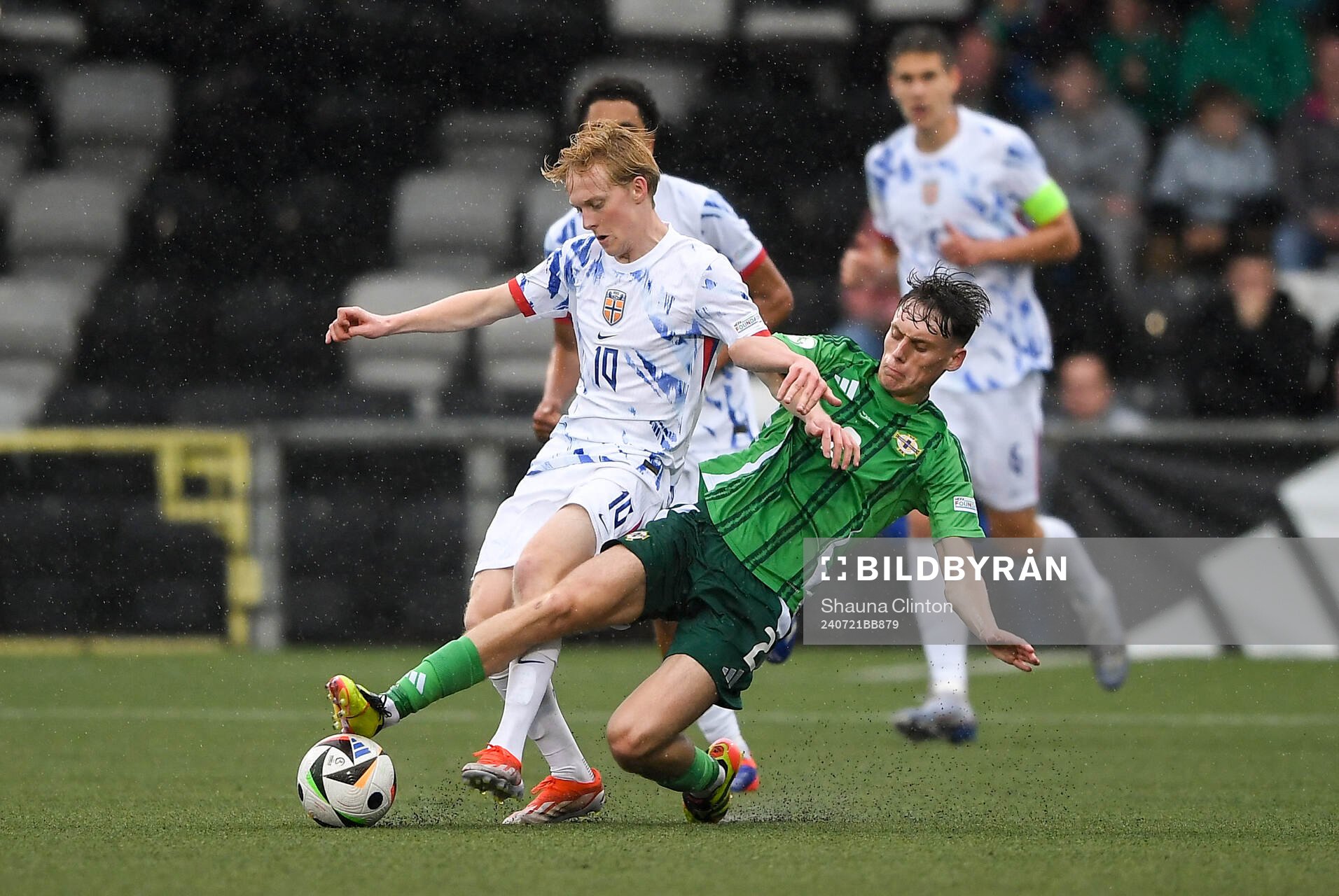Sondre Granaas of Norway is tackled by Conor Barr of