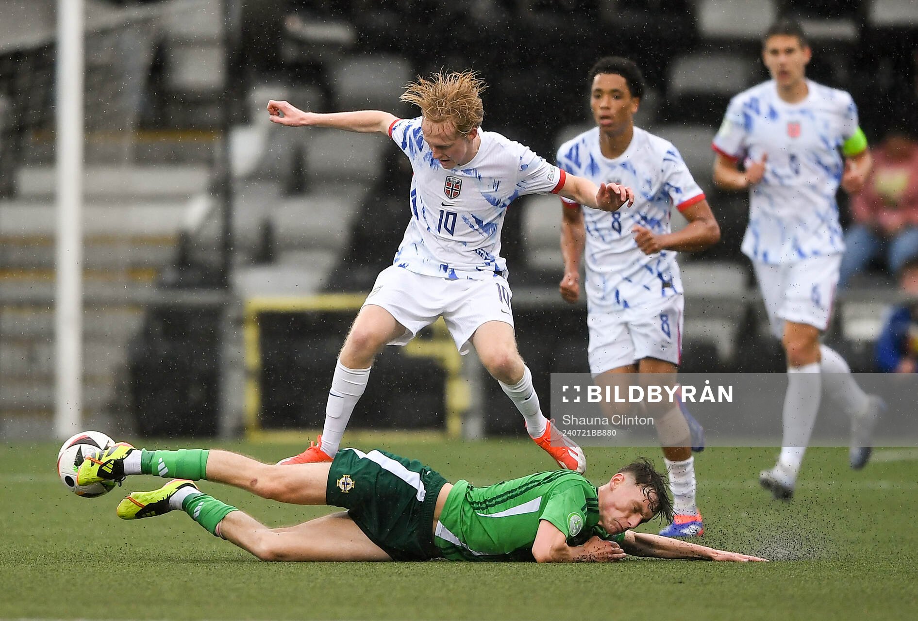 Sondre Granaas of Norway is tackled by Conor Barr of