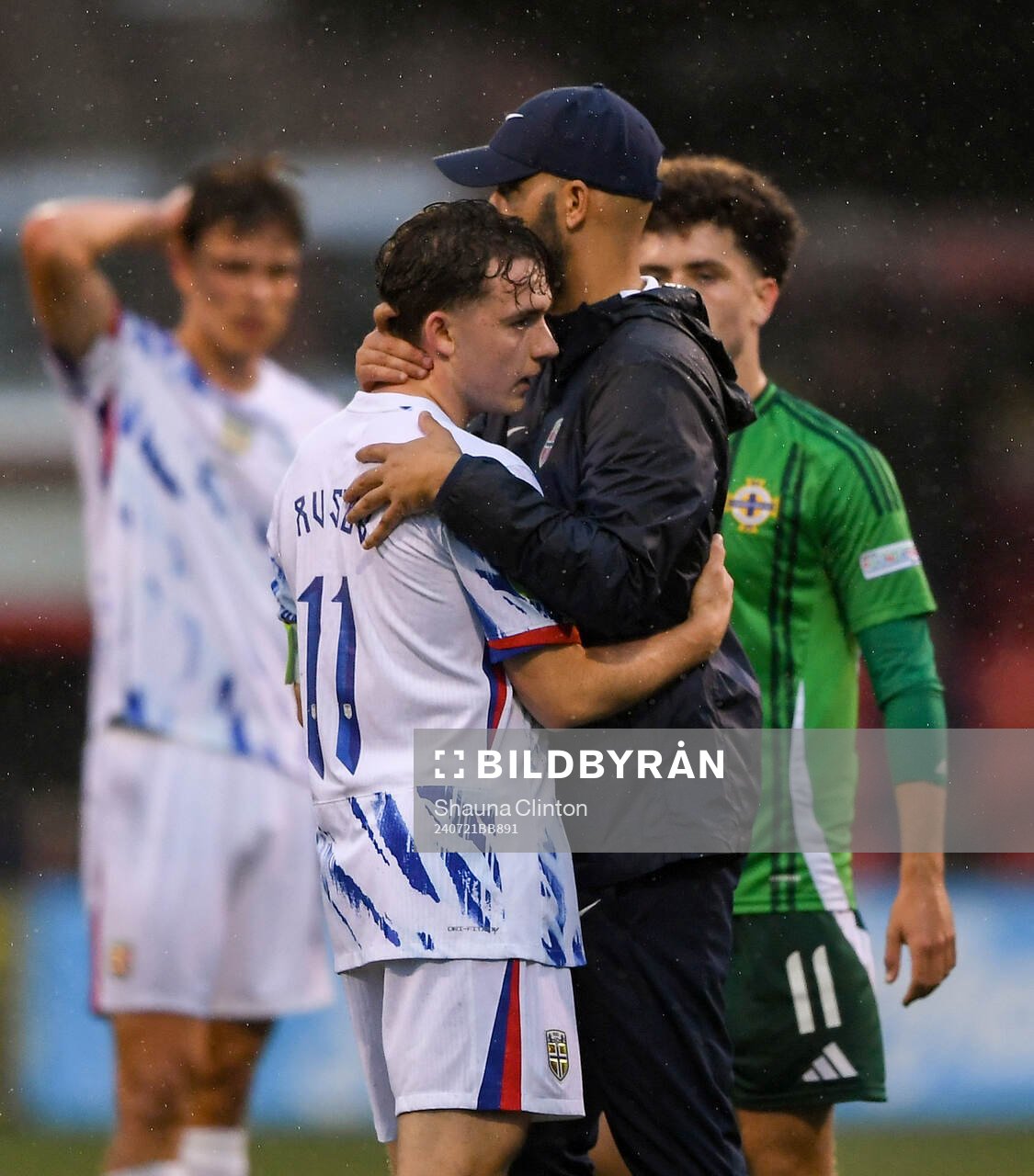 Edvin Austbo of Norway hugs head coach Luis Pimenta