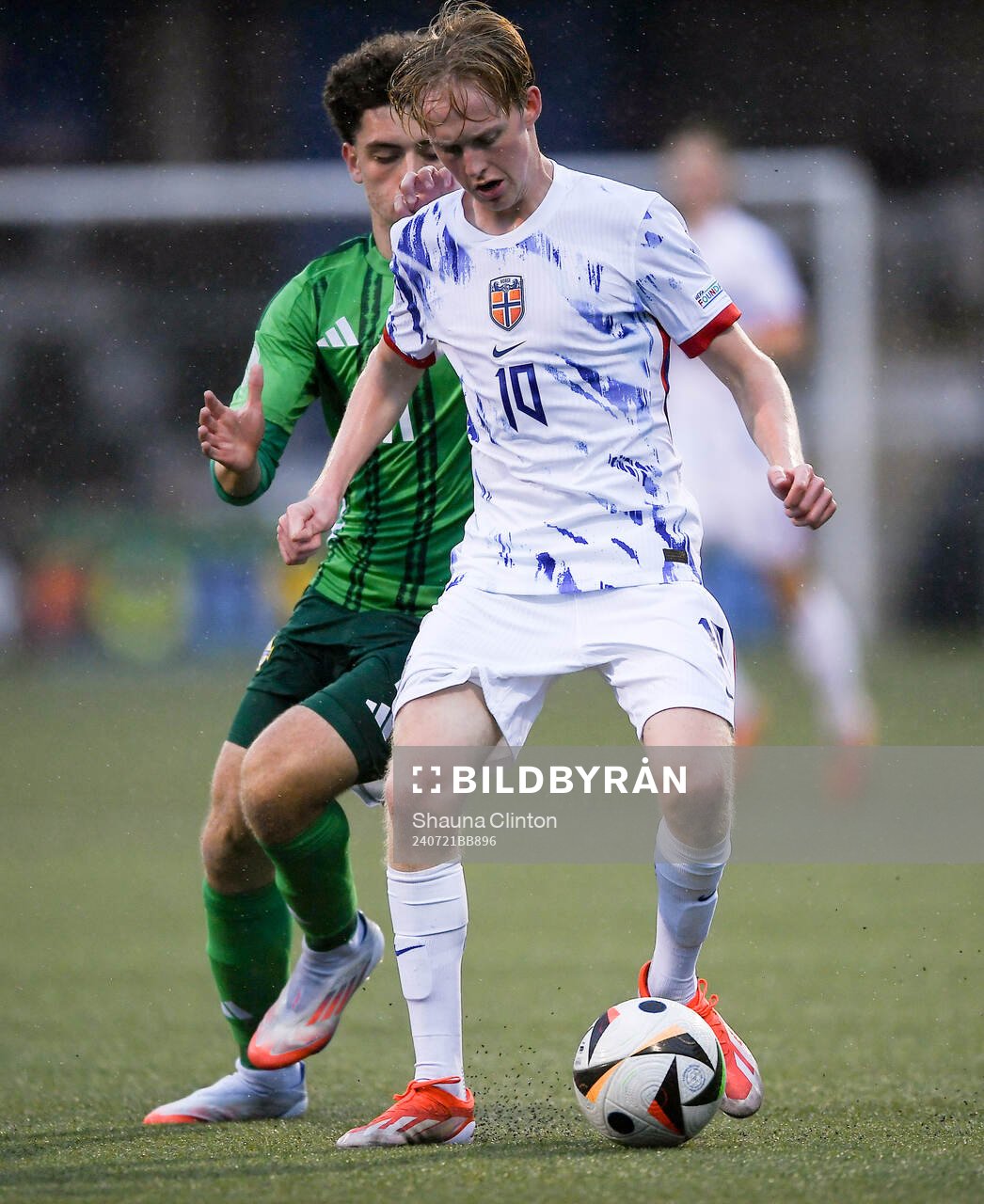 Sondre Granaas of Norway in action against Kieran Morrison