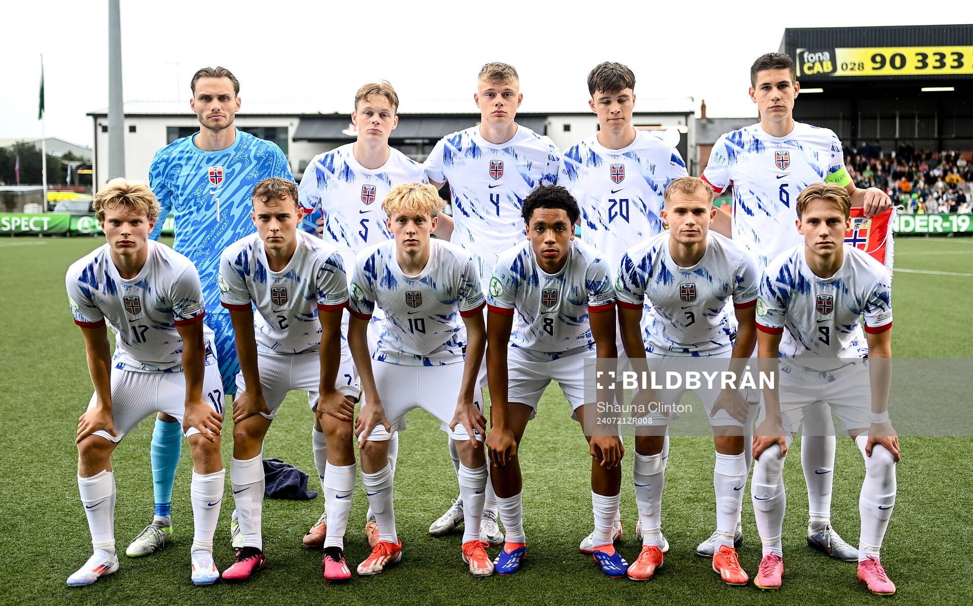 Norway players, back row, from left, Martin Borsheim, Simen Vatne Haram, Rasmus Holten, Daniel Braut and Eivind Helland, with front row, from left, Bork Bang-Kittilsen, Filip Loftesnes-Bjune, Sondre Granaas, Travis Hernes, Alexander Andresen and Benjamin Faraas pose for a team photograph before the UEFA European Under-19 Championship group stage football match between Northern Ireland and Norway on July 21, 2024 in Belfast.