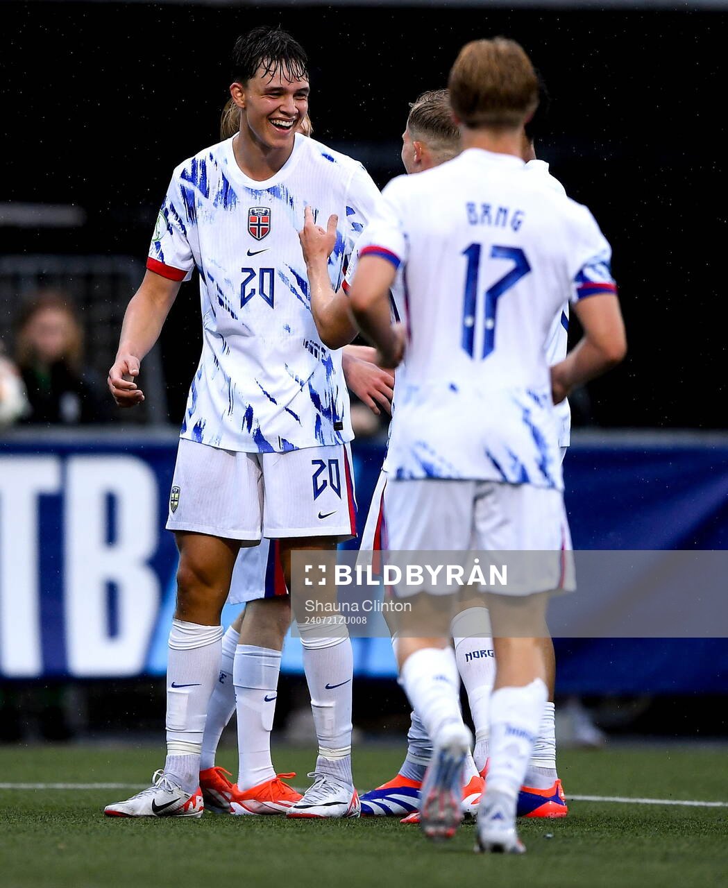 Daniel Braut of Norway celebrates with team-mates after scoring his side's second goal during the UEFA European Under-19 Championship group stage football match between Northern Ireland and Norway on July 21, 2024 in Belfast.