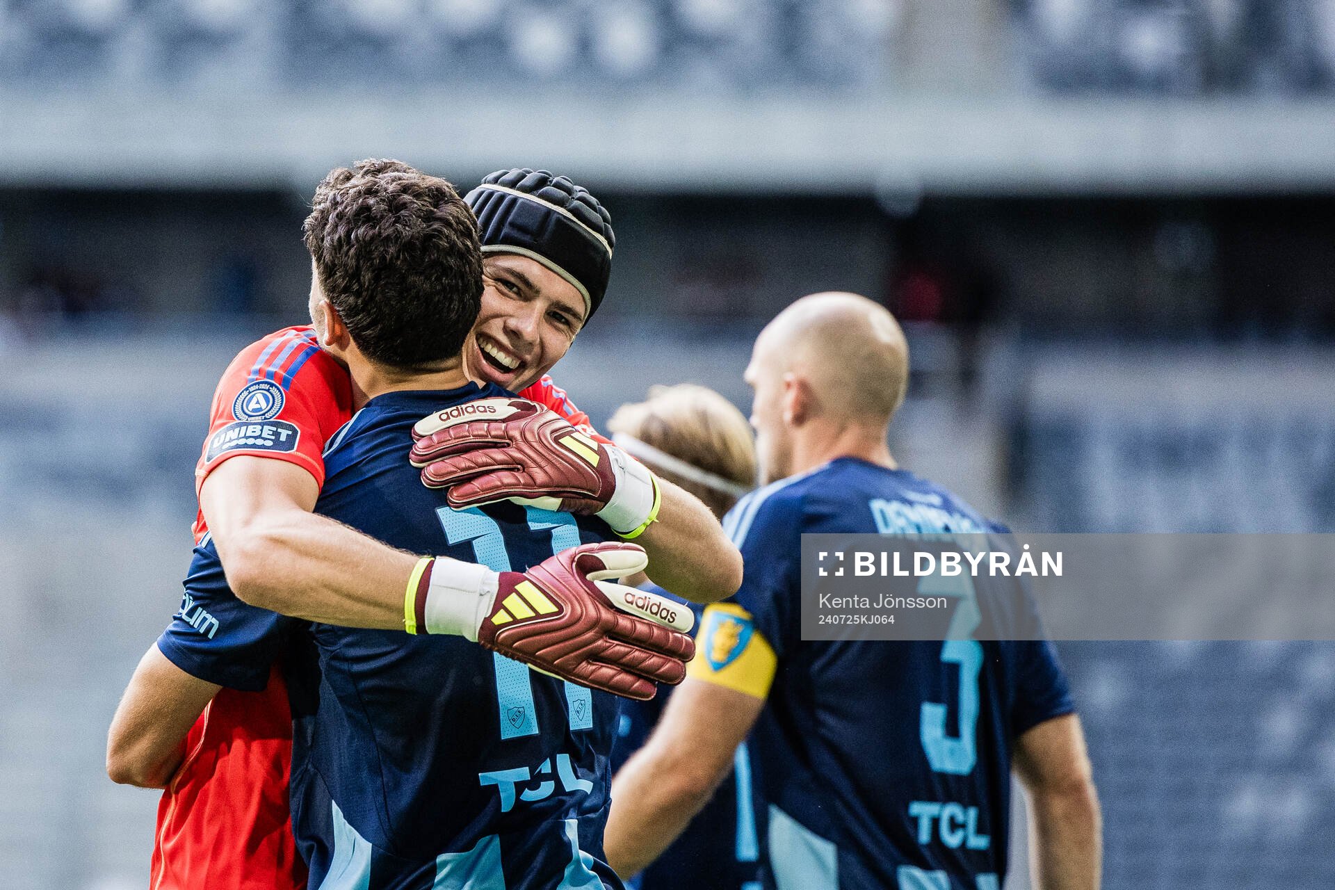 Deniz Hümmet and goalkeeper Jacob Widell Zetterström of