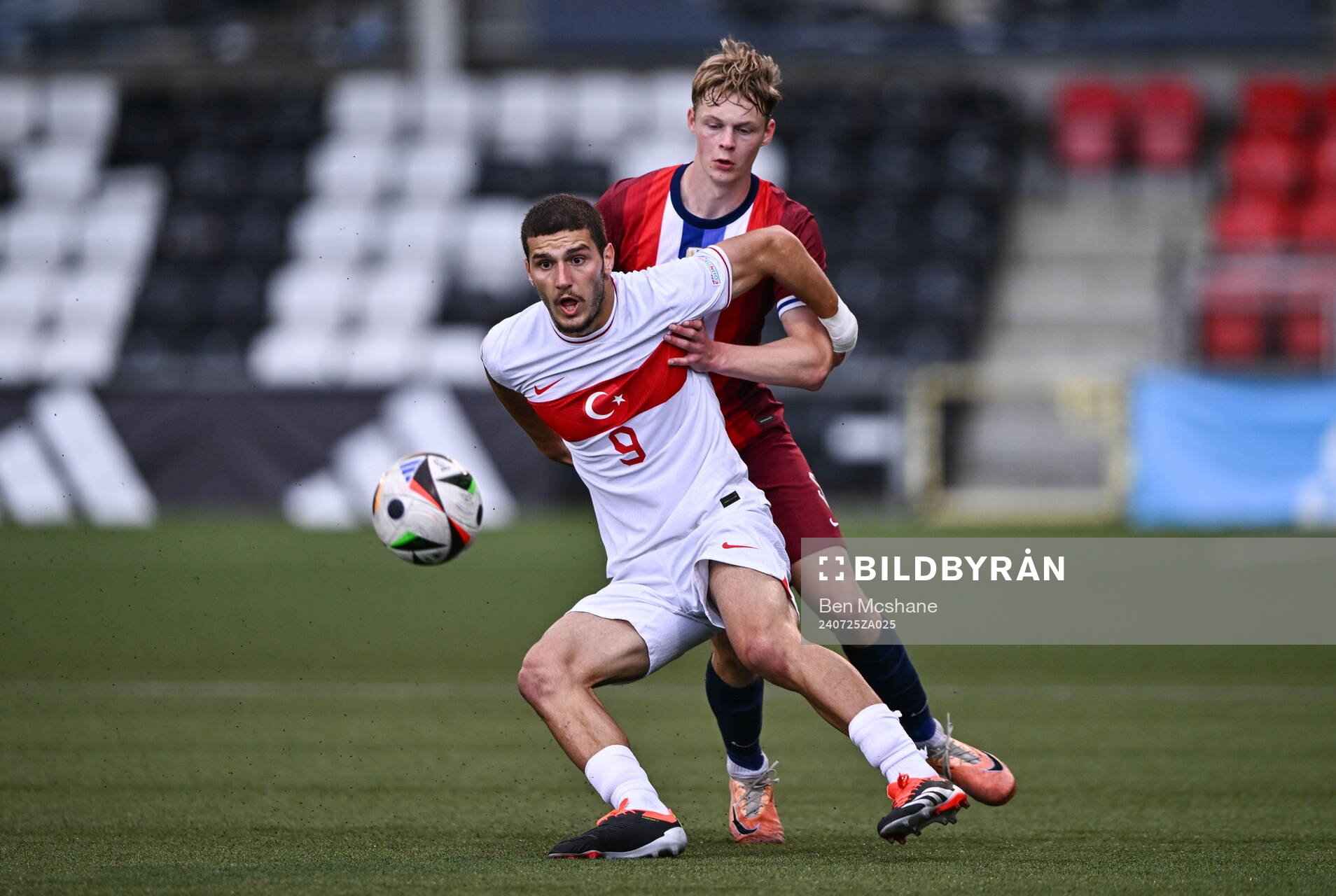 Poyraz Yildirim of Turkiye in action against Rasmus Holten