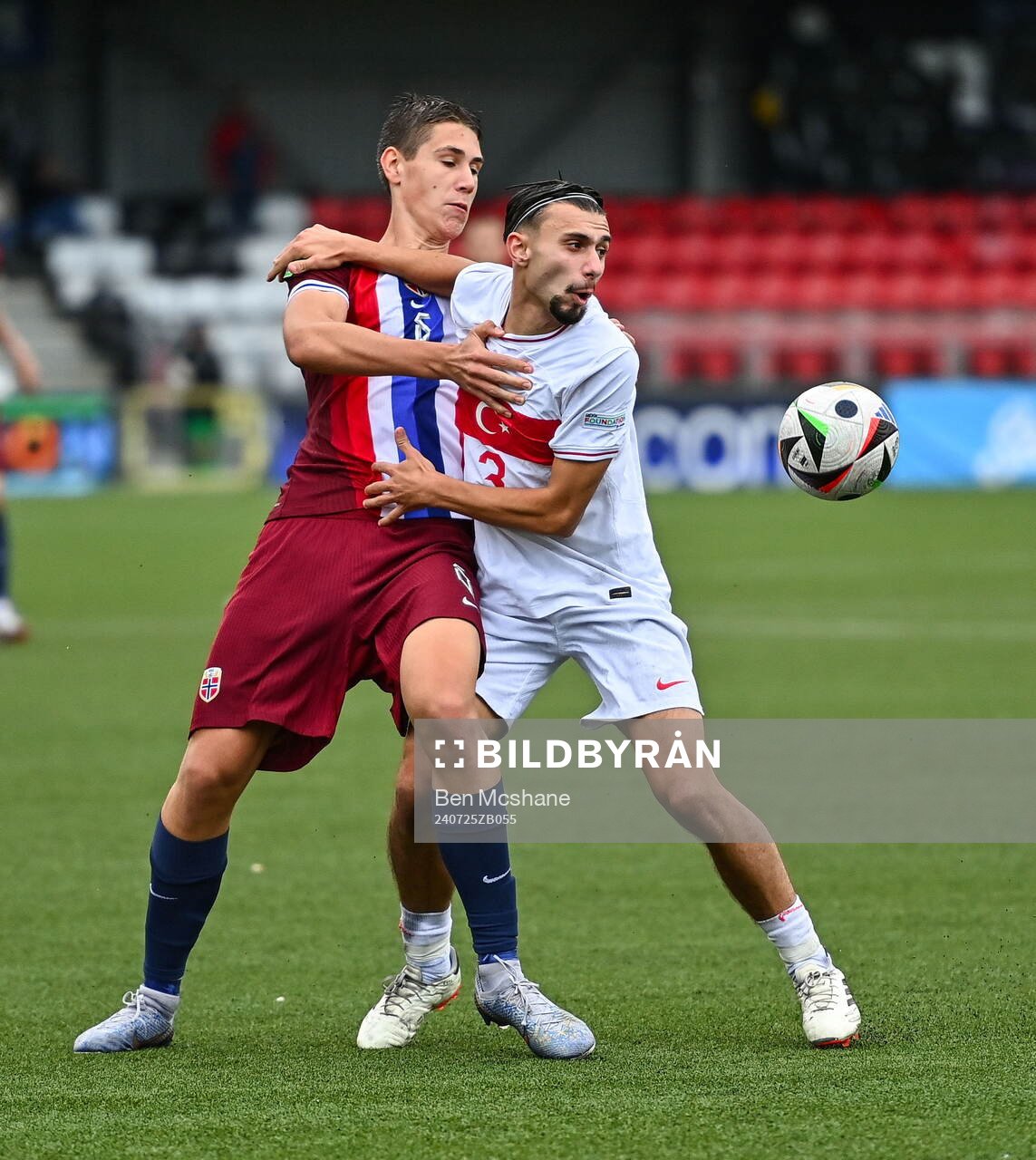Eivind Helland of Norway in action against Berkay Yilmaz of
