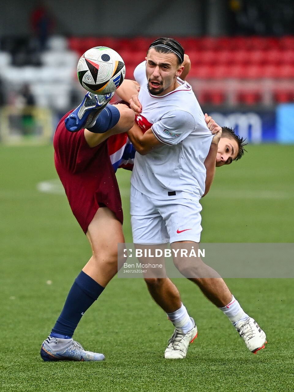 Eivind Helland of Norway in action against Berkay Yilmaz of