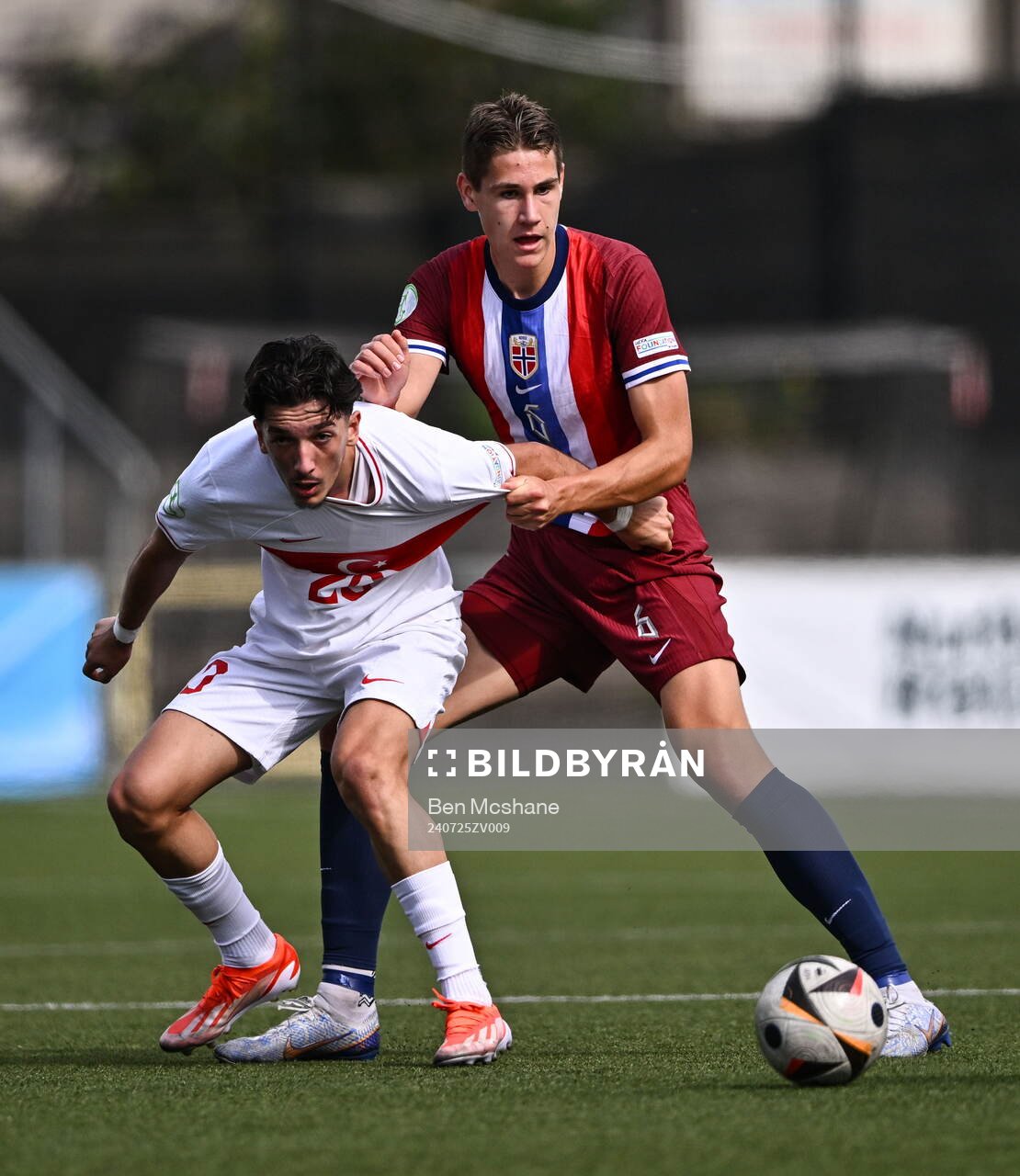 Emre Uzun of Turkiye in action against Eivind Helland of Norway during the FIFA Under-20 World Cup play-off football match between Norway and Turkey on July 25, 2024 in Belfast.