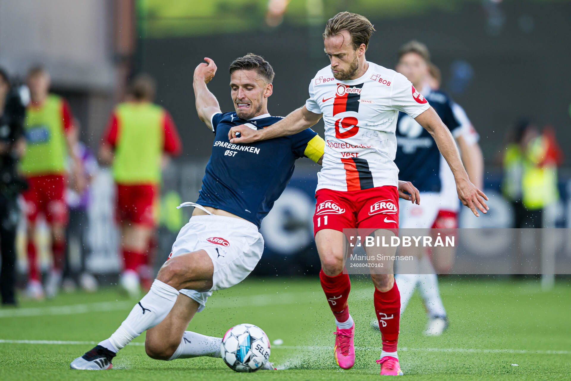 Gustav Valsvik of Strømsgodset and Bård Finne of Brann