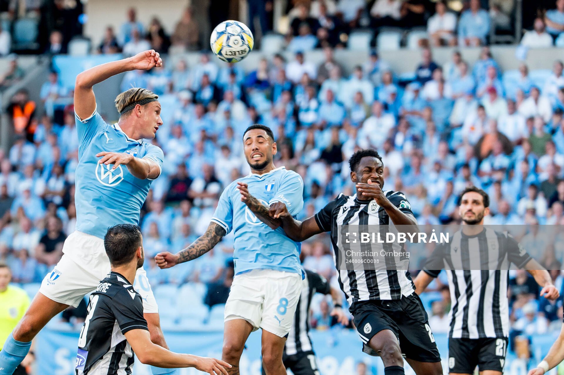 Erik Botheim and Sergio Pena of Malmö FF and Abdul Rahman