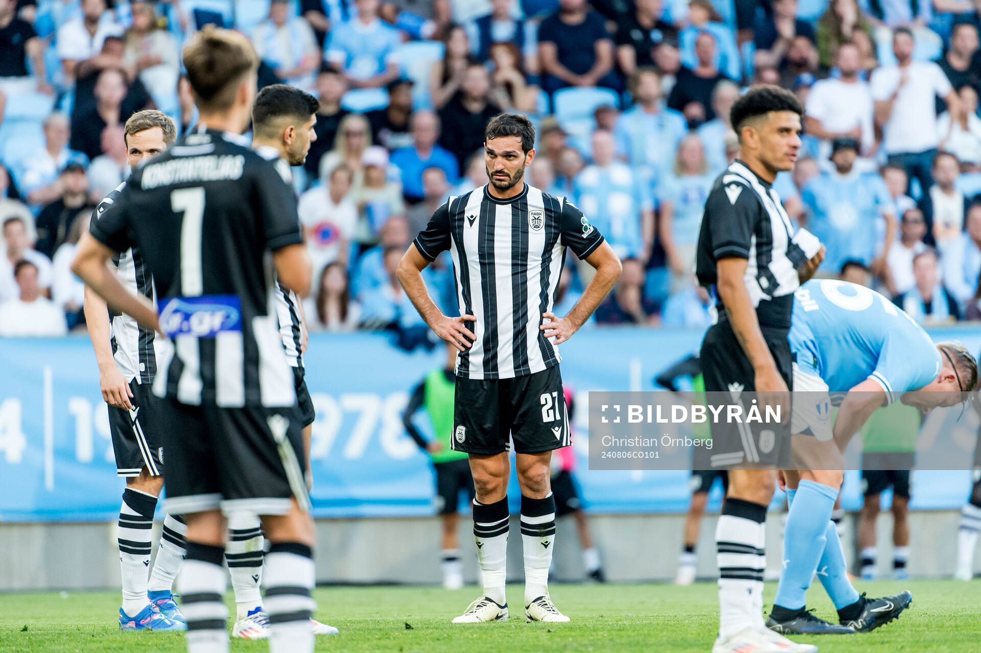 The players of PAOK looks dejected