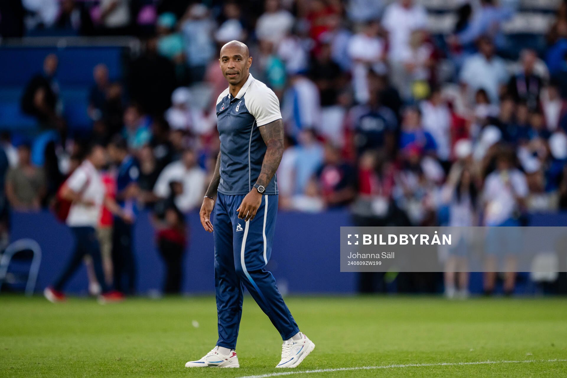 Head coach Thierry Henry of France looks dejected