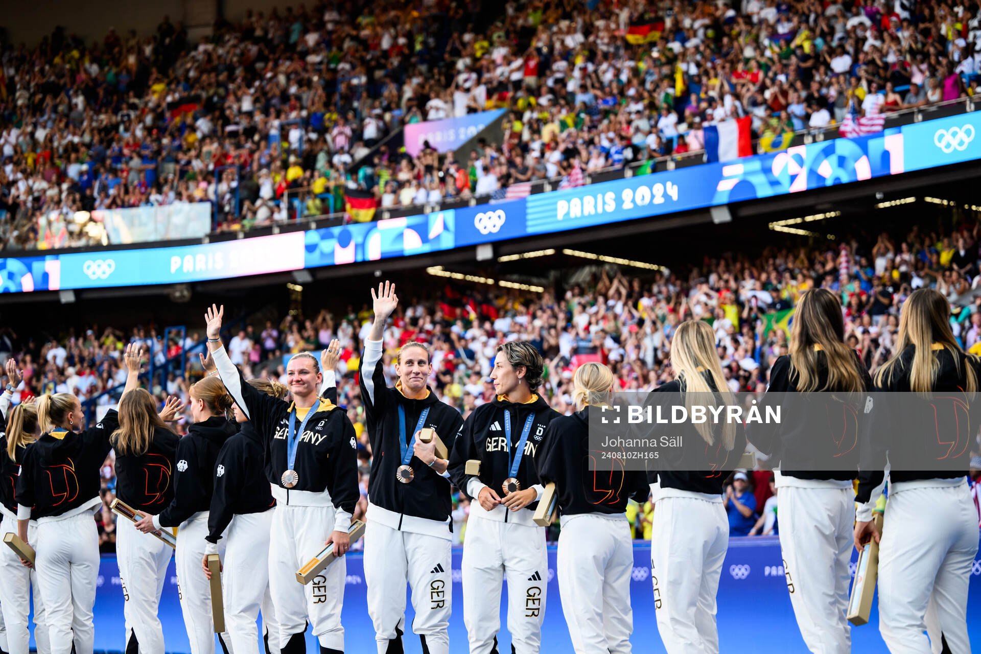 Players of Germany celebrate with their bronze medals