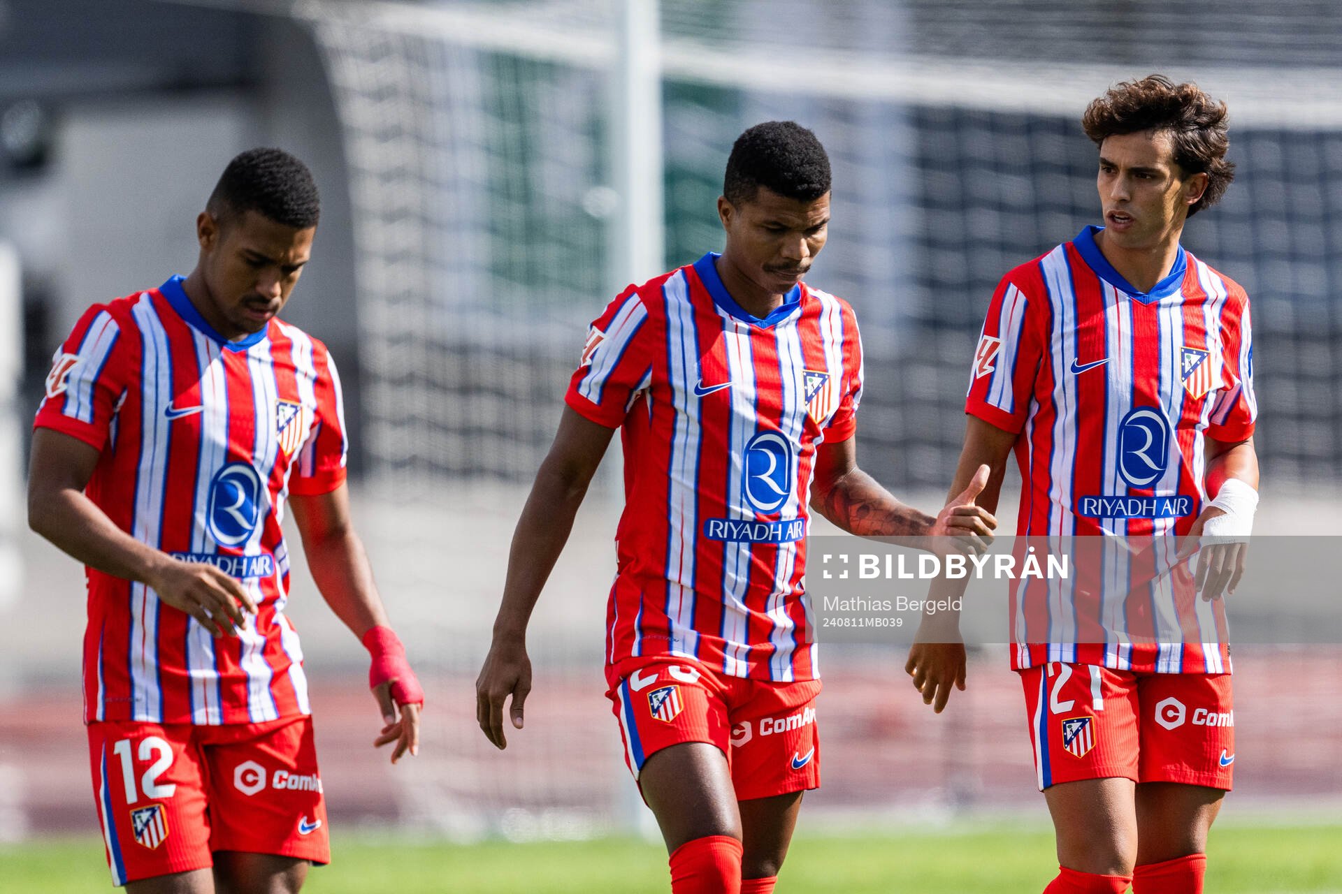 Samuel Lino, Reinaldo Mandava and Joao Felix of Atletico
