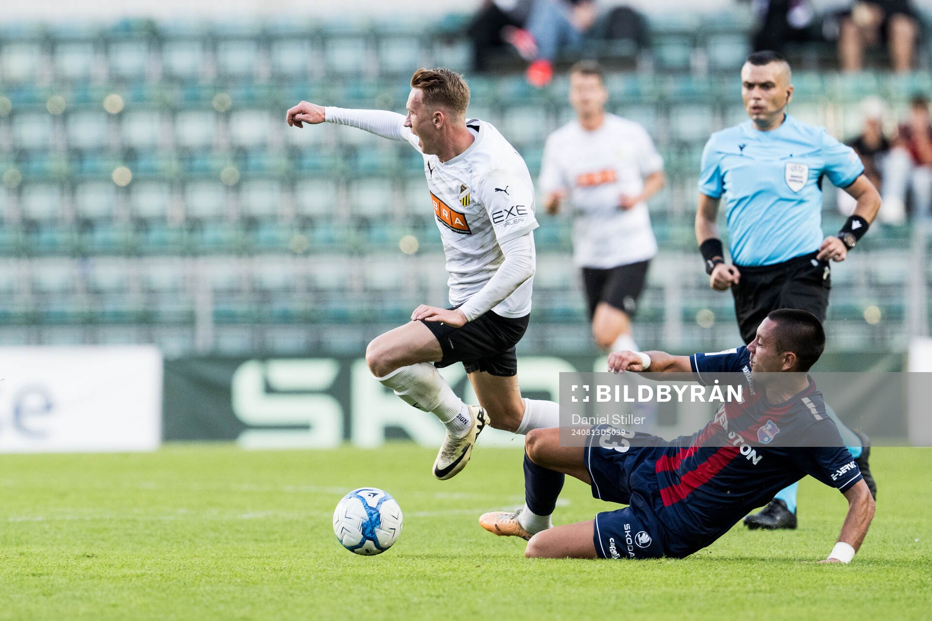 Julius Lindberg of Häcken and Milan Delevic of Paide