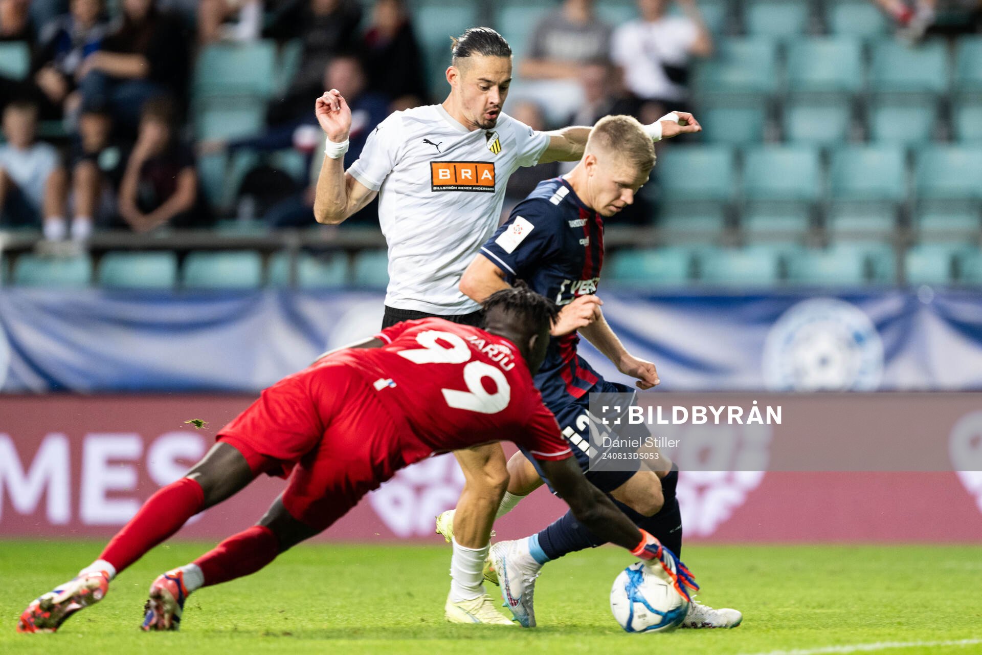 Joseph Saliste and goalkeeper Antonios Tsiftsis of Paide Linnameeskond against Amor Layouni of Häcken during the UEFA Conference League between Paide Linnameeskond and Häcken on August 13, 2024 in Tallinn.