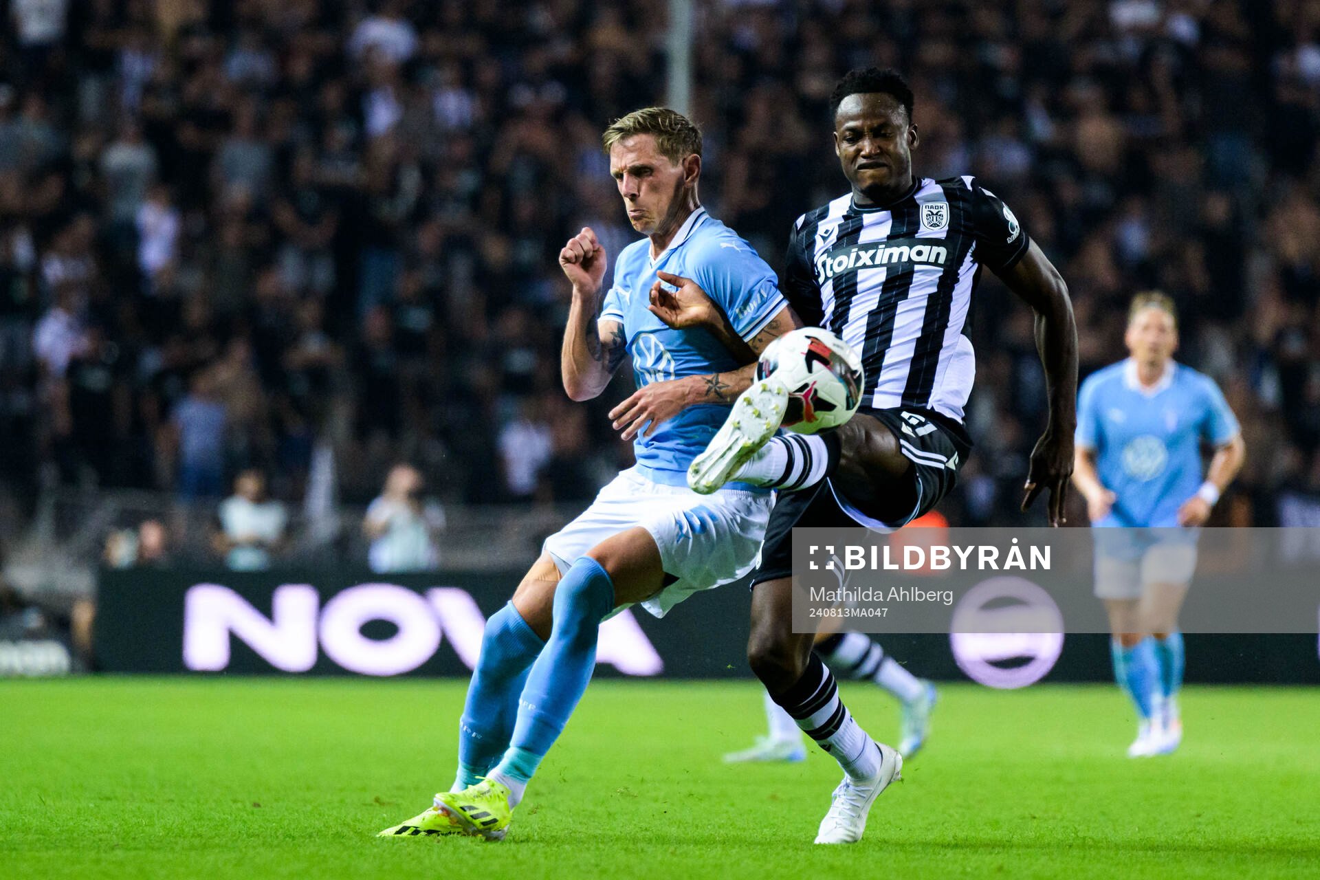 Søren Rieks of Malmö FF and Abdul Rahman Baba of PAOK