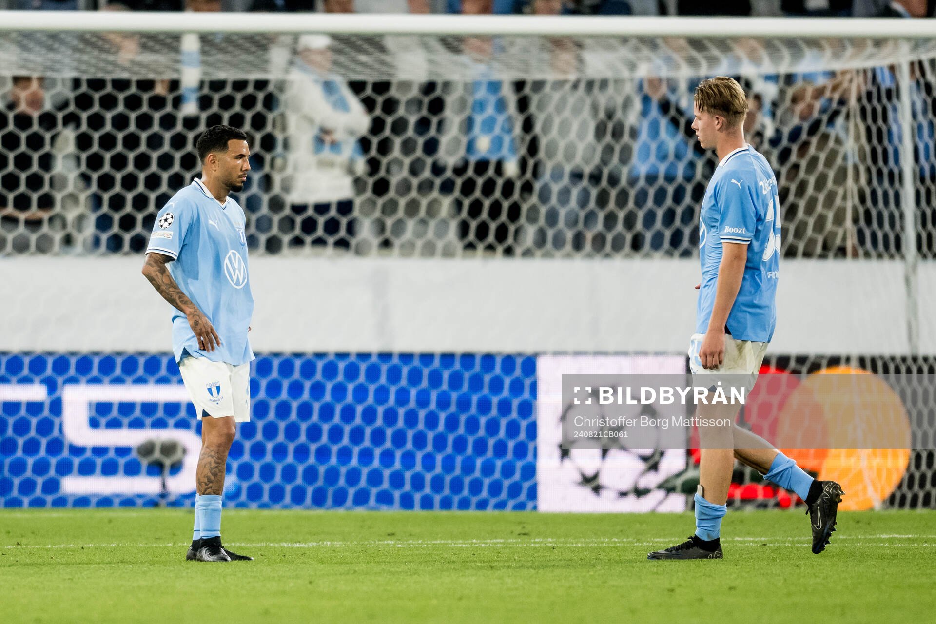 Sergio Pena and Nils Zetterström of Malmö FF look dejected