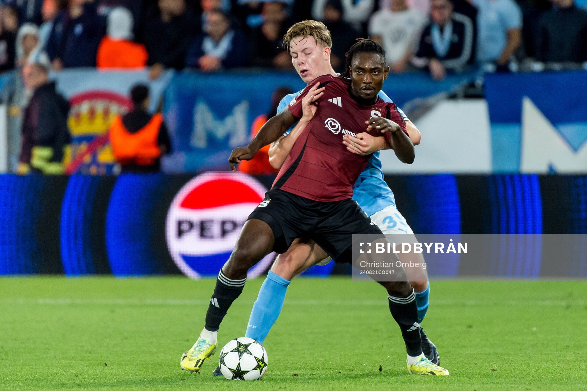 Victor Olatunji of Sparta Prag and Nils Zetterström of Malmö FF during the UEFA Champions League football match between Malmö FF and Sparta Prag on August 21, 2024 in Malmö.