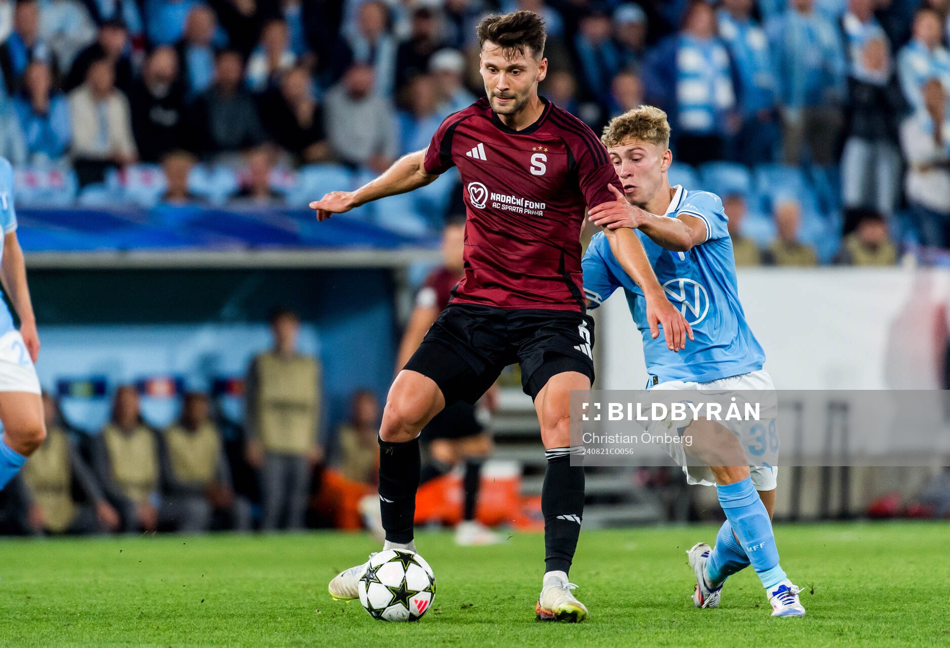 Kaan Kairinen of Sparta Prag and Hugo Bolin of Malmö FF during the UEFA Champions League football match between Malmö FF and Sparta Prag on August 21, 2024 in Malmö. 