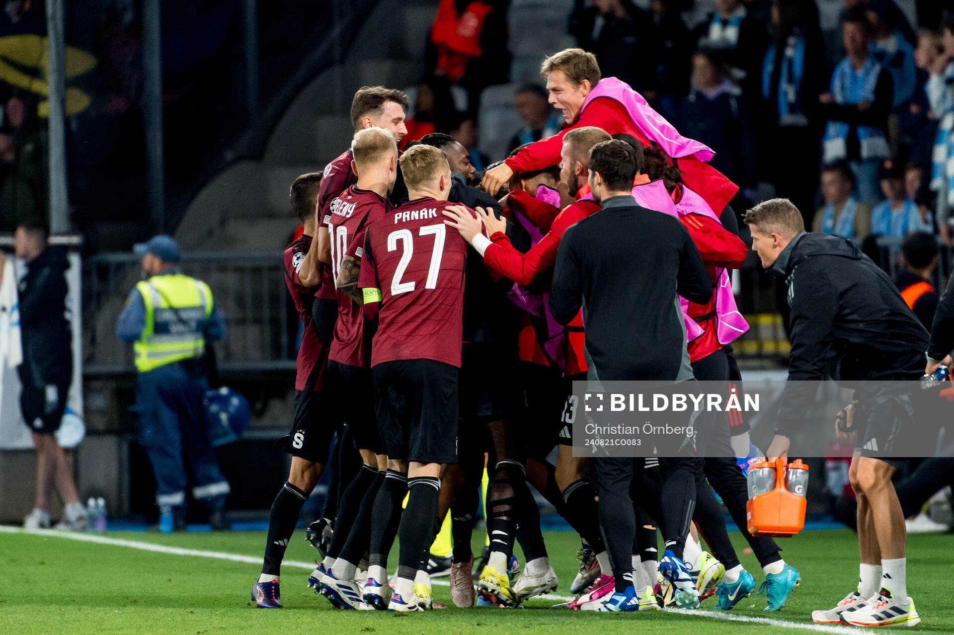 Matej Rynes of Sparta Prag celebrate with teammates after scoring the 0-2 goal during the UEFA Champions League football match between Malmö FF and Sparta Prag on August 21, 2024 in Malmö.