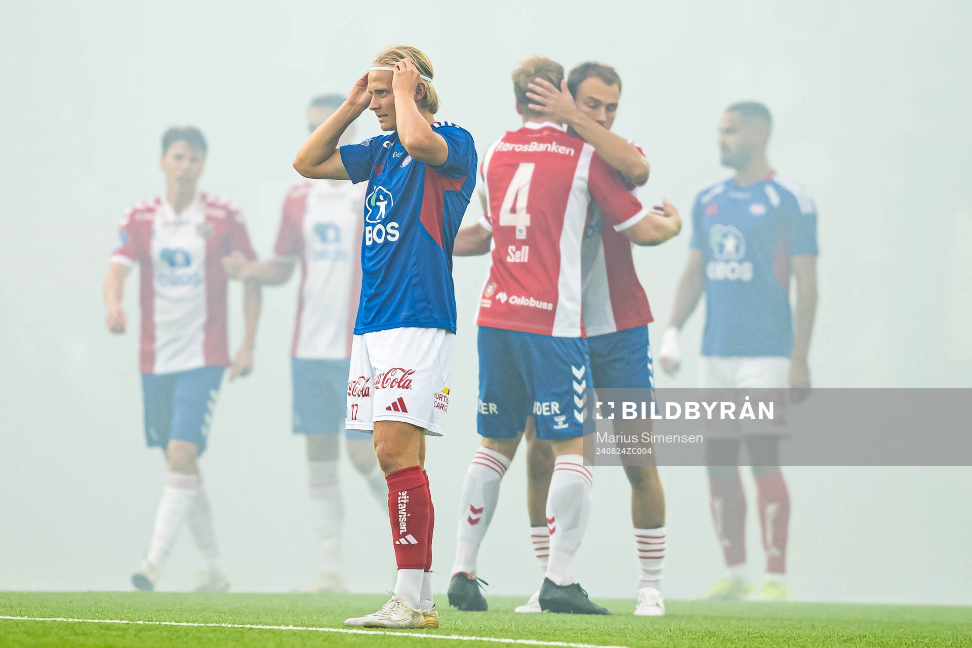 Carl Lange of Vålerenga looks dejected