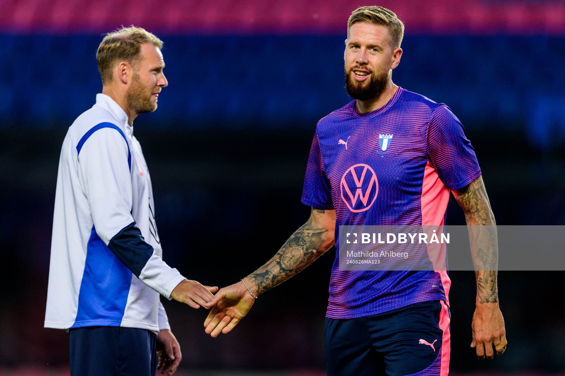 Assistant coach Ola Toivonen and Pontus Jansson of Malmö FF