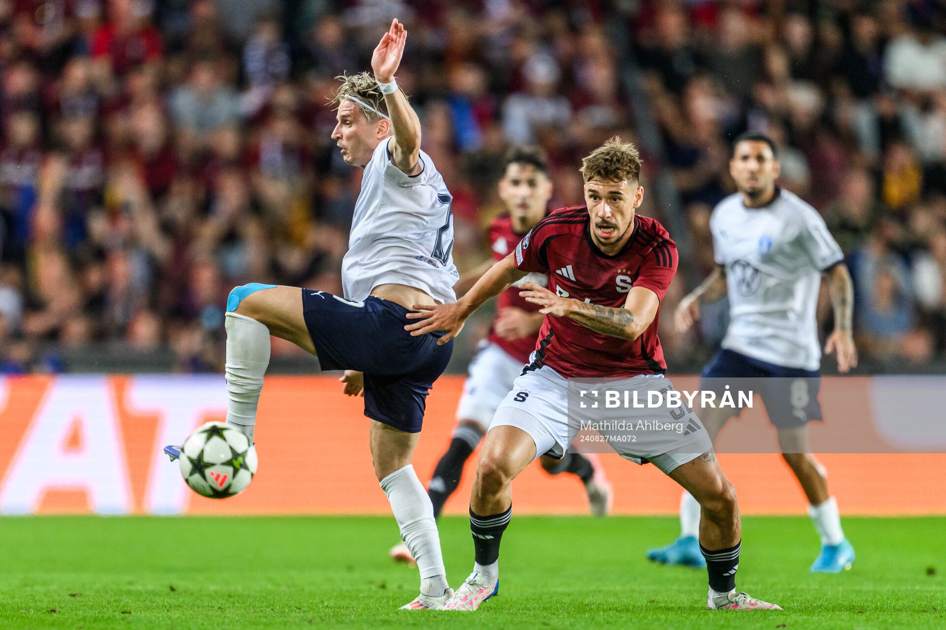 Jens Stryger Larsen of Malmö FF and Matej Rynes of Sparta