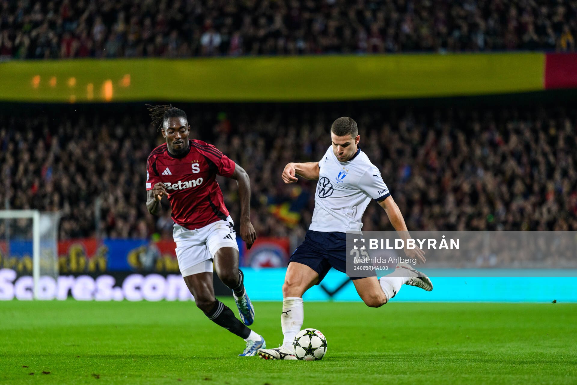Victor Olatunji of Sparta Prague and Sergio Pena of Malmö FF during the UEFA Champions League football match between Sparta Prague and Malmö FF on August 27, 2024 in Prague. 