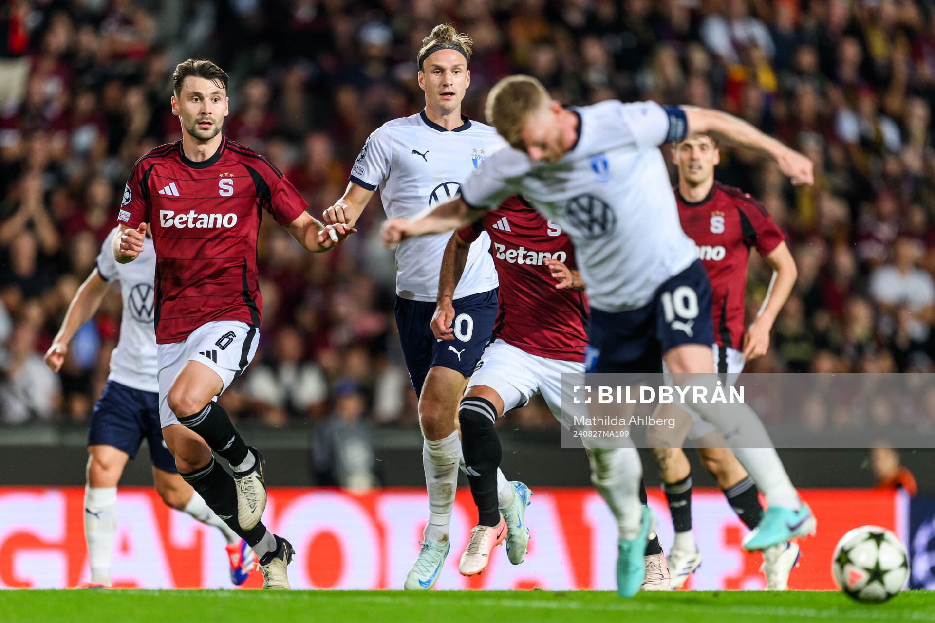 Kaan Kairinen of Sparta Prague and Erik Botheim of Malmö FF during the UEFA Champions League football match between Sparta Prague and Malmö FF on August 27, 2024 in Prague. 