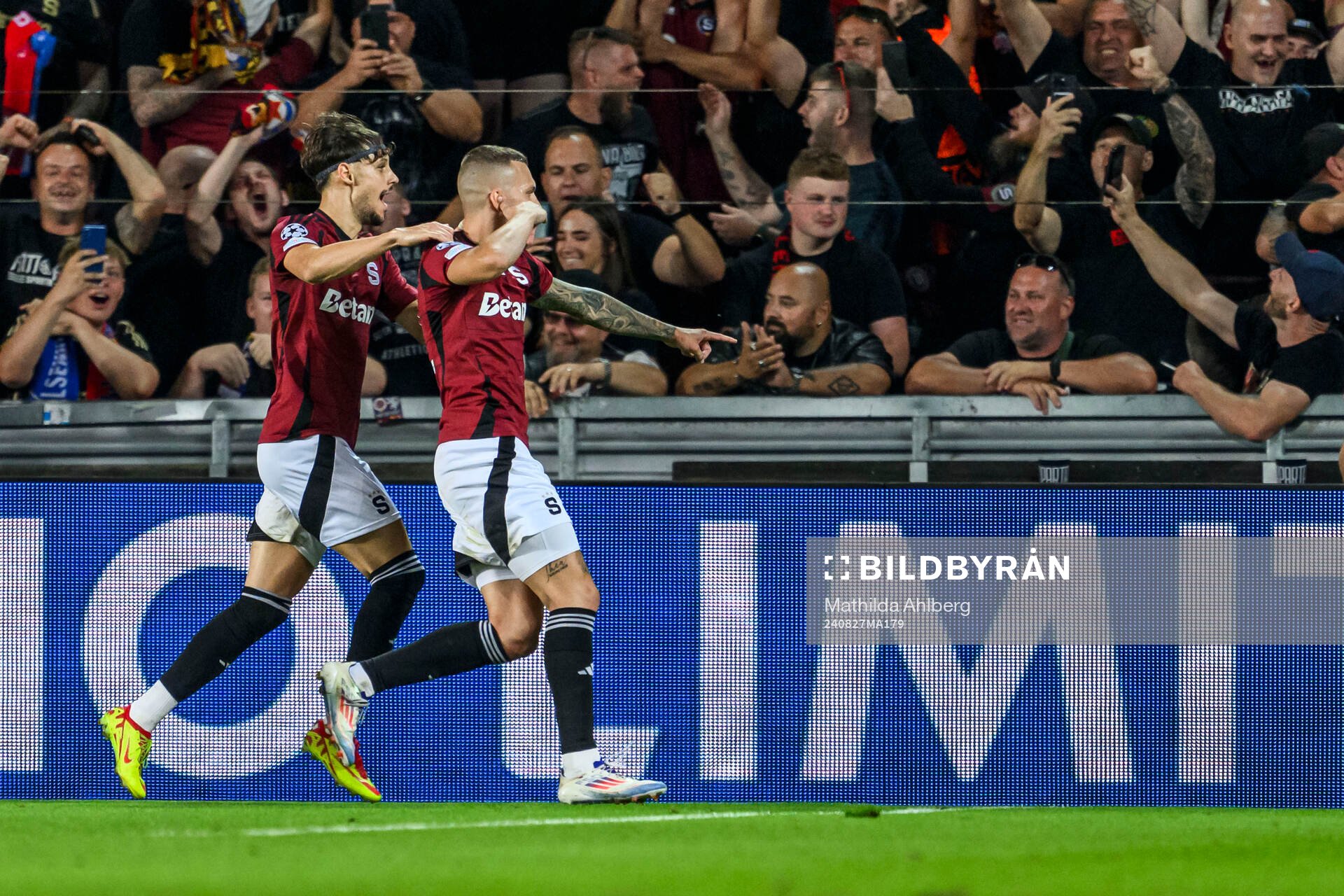 Veljko Birmancevic and Lukas Haraslin of Sparta Prag celebrate 1-0 during the UEFA Champions League football match between Sparta Prague and Malmö FF on August 27, 2024 in Prague.