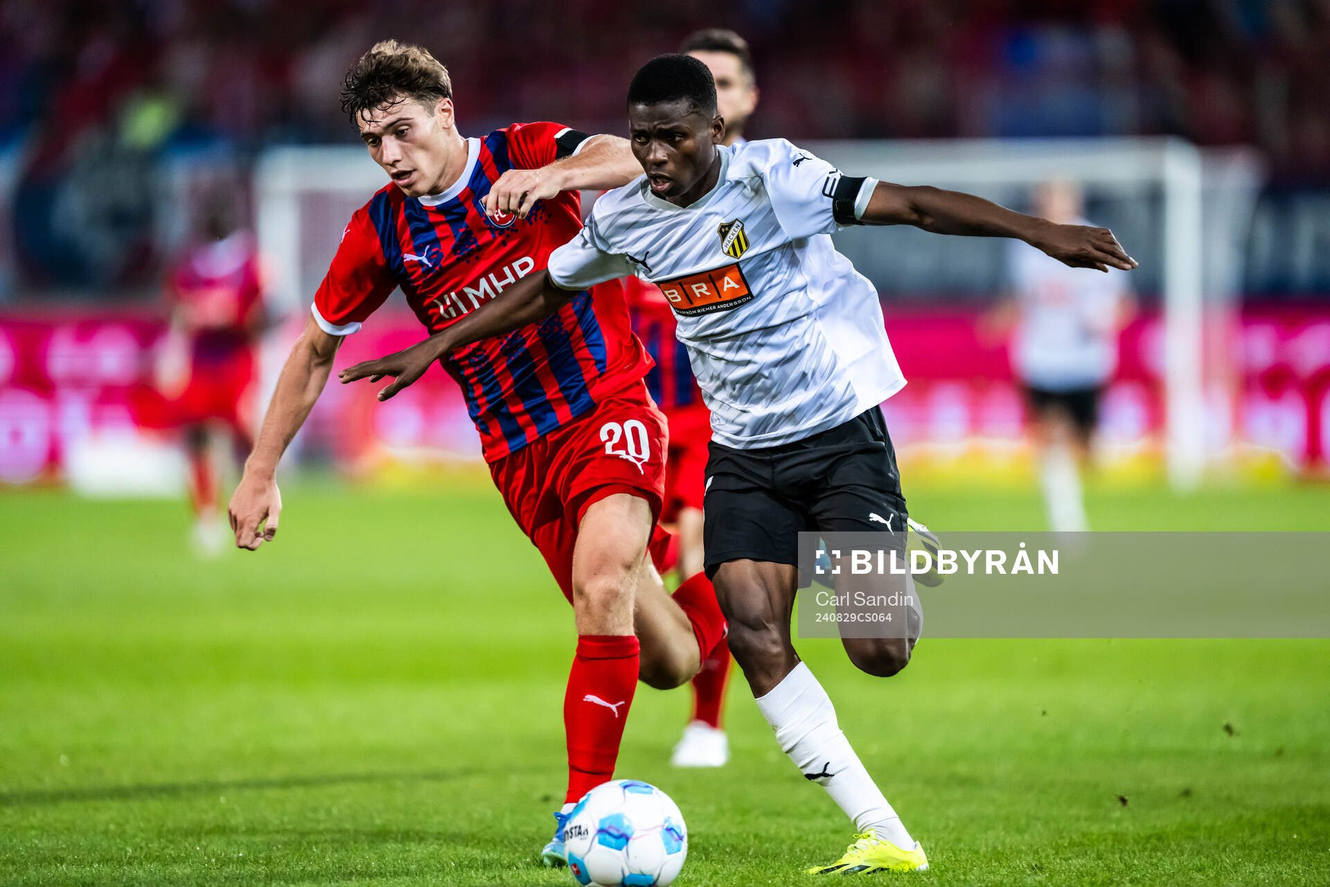 Luca Kerber of Heidenheim and Akoua Romeo Amane of Häcken