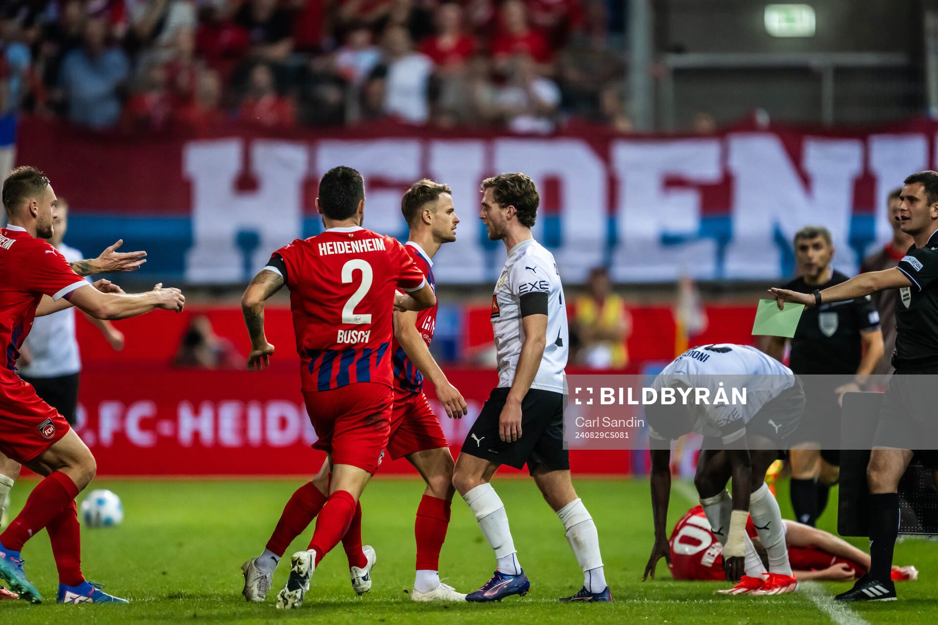 Leo Scienza of Heidenheim and Adam Lundkvist of Häcken during the UEFA Conference League play-off match between Heidenheim and Häcken on August 29, 2024 in Heidenheim.