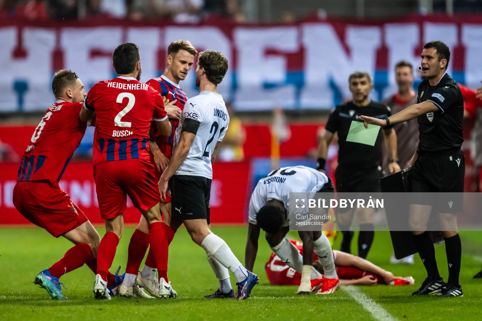 Leo Scienza of Heidenheim and Adam Lundkvist of Häcken during the UEFA Conference League play-off match between Heidenheim and Häcken on August 29, 2024 in Heidenheim.