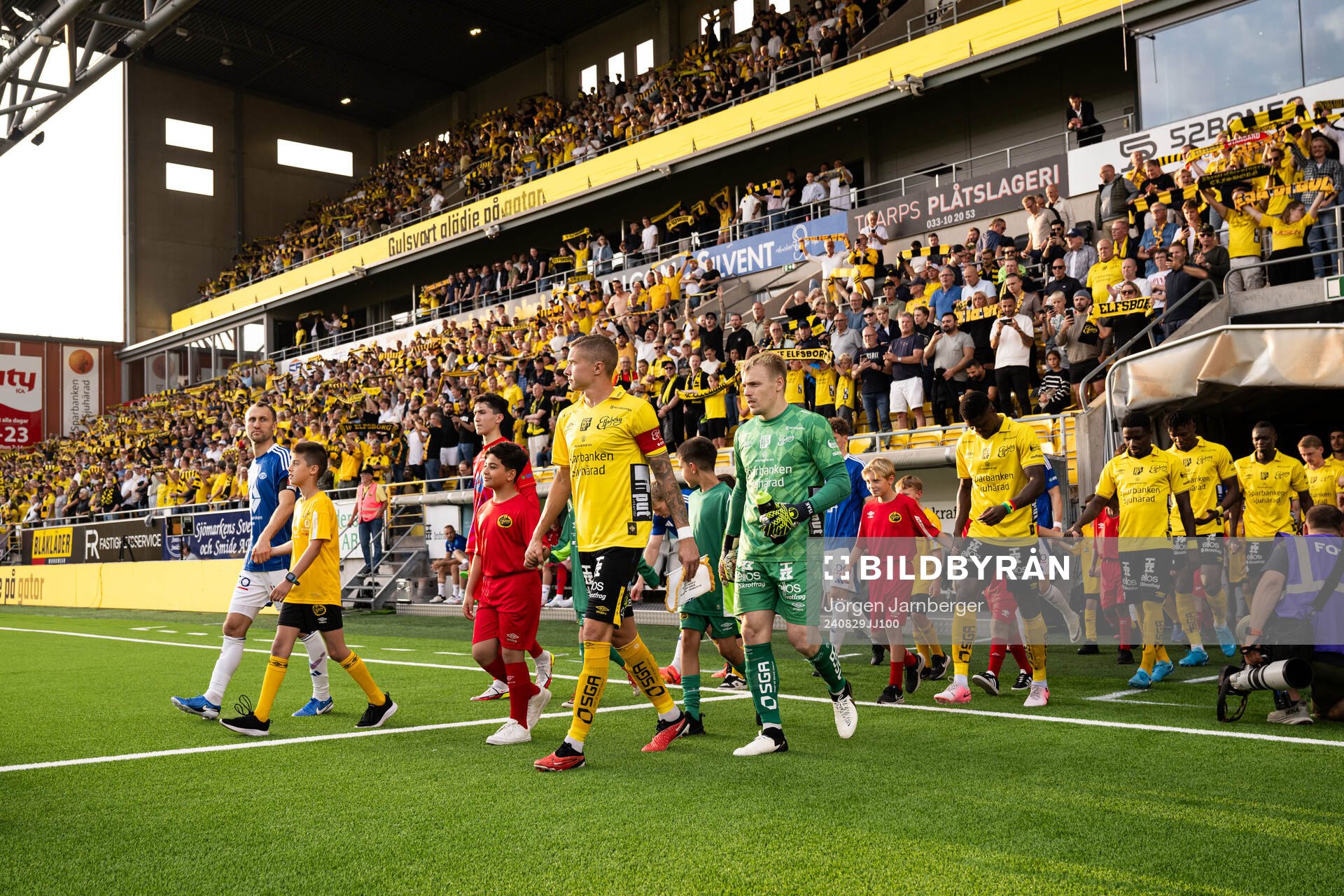 The teams enters the arena
